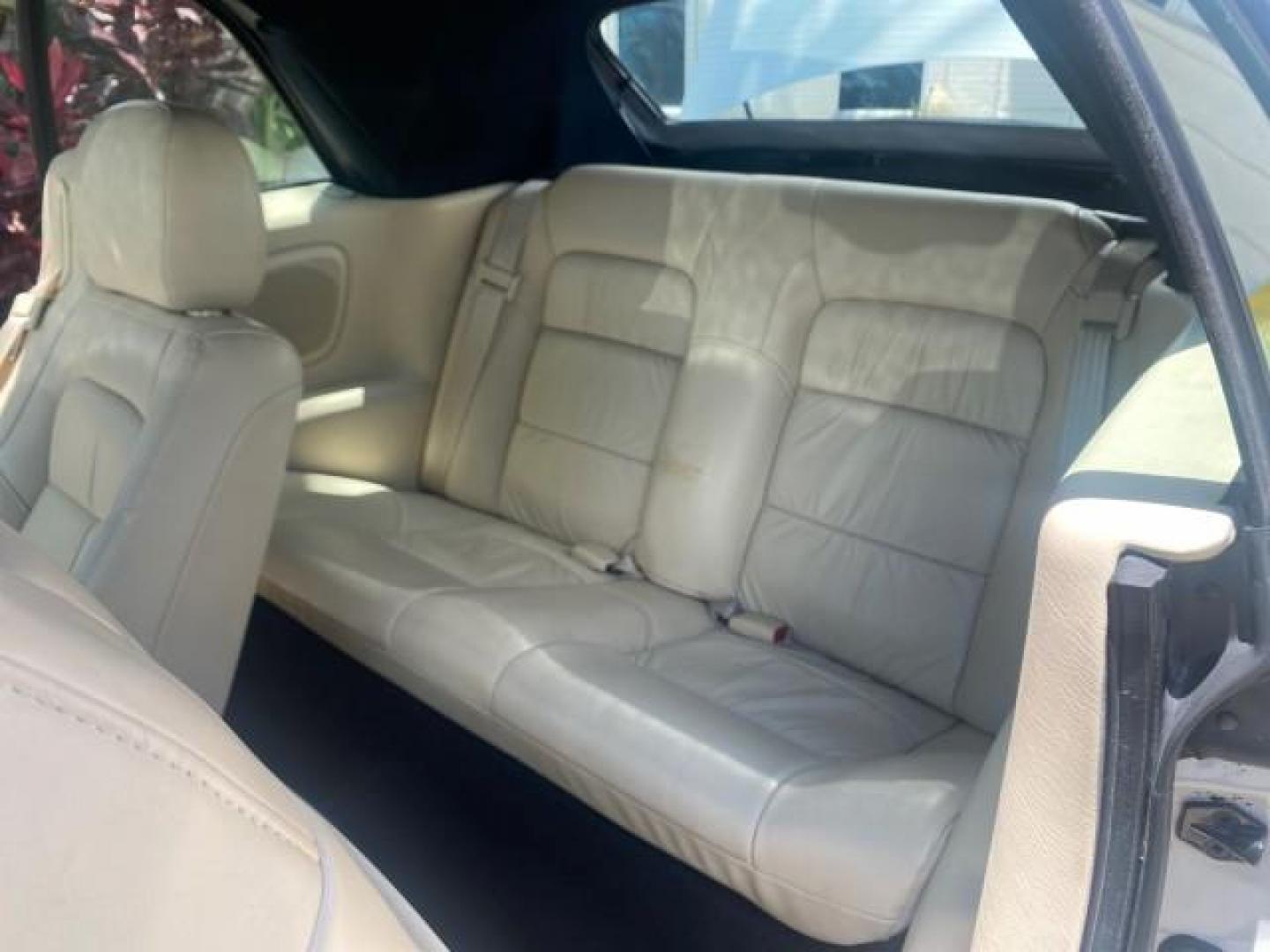 2002 Stone White /Royal Blue/Cream Chrysler Sebring Limited FL LOW MILES 34,440 (1C3EL65R52N) with an 2.7L MFI DOHC 24-Valve V6 Engine engine, Automatic transmission, located at 4701 North Dixie Hwy, Pompano Beach, FL, 33064, (954) 422-2889, 26.240938, -80.123474 - OUR WEBPAGE FLORIDACARS1.COM HAS OVER 100 PHOTOS AND FREE CARFAX LINK 2002 CHRYSLER SEBRING LIMITED VIN: 1C3EL65R52N169318 1 C 3 E L 6 5 R 5 2 N 1 6 9 3 1 8 CONVERTIBLE 2.7L V6 F DOHC GASOLINE FRONT WHEEL DRIVE Top Features Alloy Wheels Soft Top Infinity Sound System Sunroof(s) Leather Seats Basic F - Photo#14
