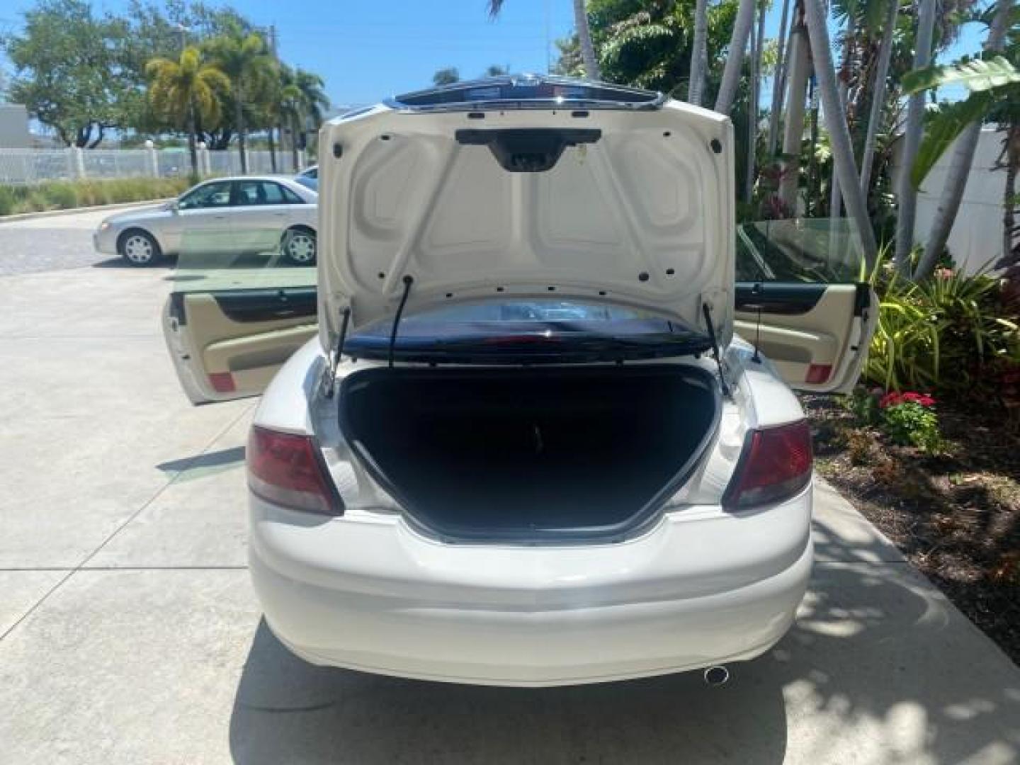 2002 Stone White /Royal Blue/Cream Chrysler Sebring Limited FL LOW MILES 34,440 (1C3EL65R52N) with an 2.7L MFI DOHC 24-Valve V6 Engine engine, Automatic transmission, located at 4701 North Dixie Hwy, Pompano Beach, FL, 33064, (954) 422-2889, 26.240938, -80.123474 - OUR WEBPAGE FLORIDACARS1.COM HAS OVER 100 PHOTOS AND FREE CARFAX LINK 2002 CHRYSLER SEBRING LIMITED VIN: 1C3EL65R52N169318 1 C 3 E L 6 5 R 5 2 N 1 6 9 3 1 8 CONVERTIBLE 2.7L V6 F DOHC GASOLINE FRONT WHEEL DRIVE Top Features Alloy Wheels Soft Top Infinity Sound System Sunroof(s) Leather Seats Basic F - Photo#15