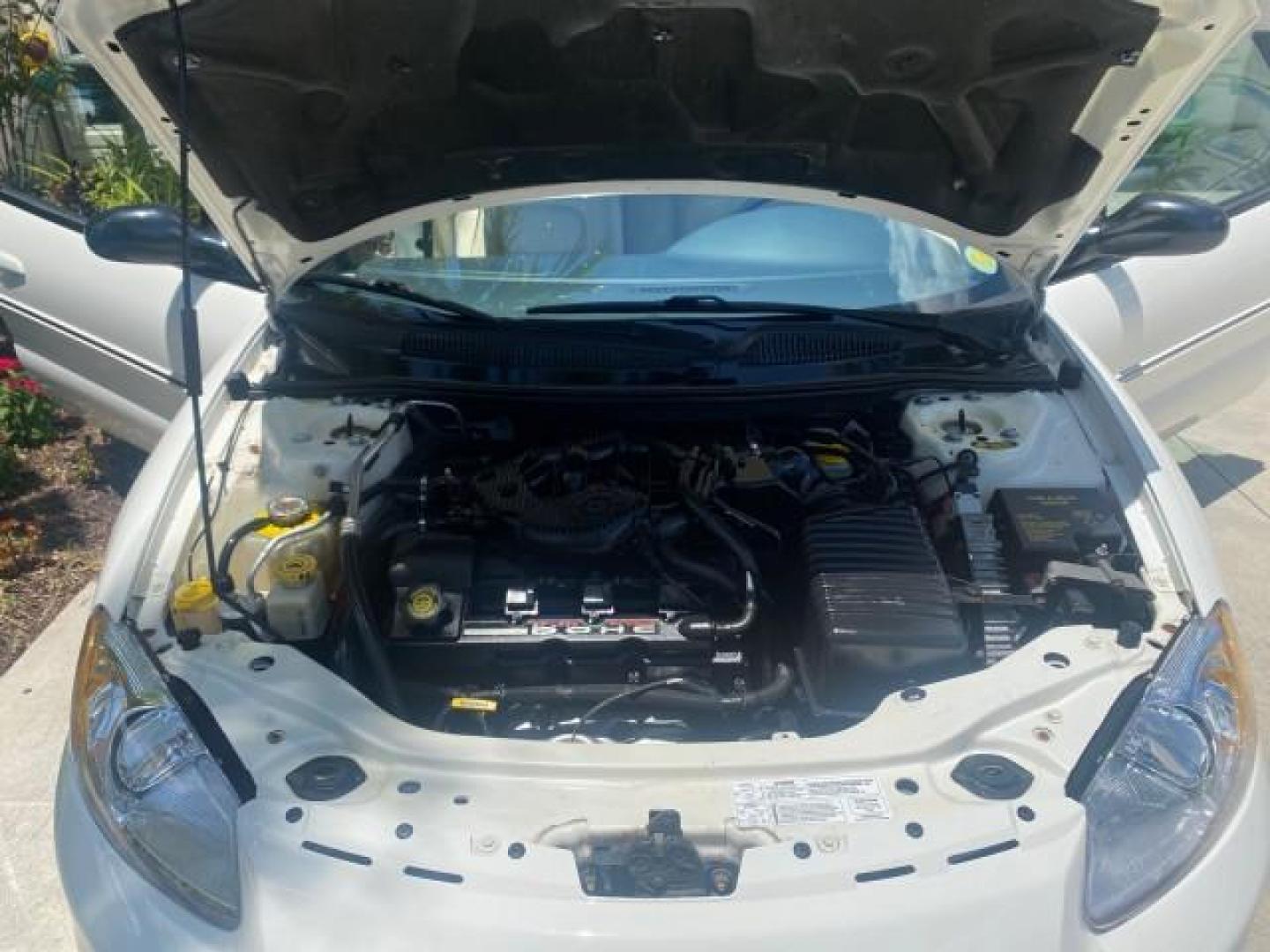 2002 Stone White /Royal Blue/Cream Chrysler Sebring Limited FL LOW MILES 34,440 (1C3EL65R52N) with an 2.7L MFI DOHC 24-Valve V6 Engine engine, Automatic transmission, located at 4701 North Dixie Hwy, Pompano Beach, FL, 33064, (954) 422-2889, 26.240938, -80.123474 - OUR WEBPAGE FLORIDACARS1.COM HAS OVER 100 PHOTOS AND FREE CARFAX LINK 2002 CHRYSLER SEBRING LIMITED VIN: 1C3EL65R52N169318 1 C 3 E L 6 5 R 5 2 N 1 6 9 3 1 8 CONVERTIBLE 2.7L V6 F DOHC GASOLINE FRONT WHEEL DRIVE Top Features Alloy Wheels Soft Top Infinity Sound System Sunroof(s) Leather Seats Basic F - Photo#17