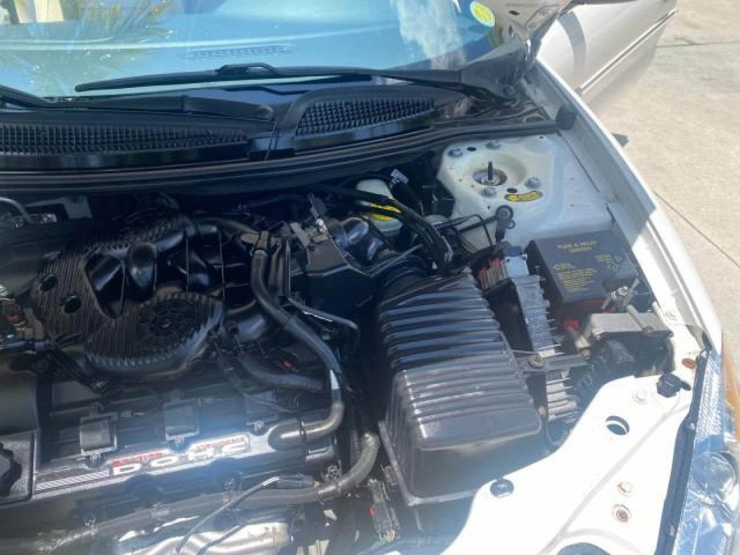 2002 Stone White /Royal Blue/Cream Chrysler Sebring Limited FL LOW MILES 34,440 (1C3EL65R52N) with an 2.7L MFI DOHC 24-Valve V6 Engine engine, Automatic transmission, located at 4701 North Dixie Hwy, Pompano Beach, FL, 33064, (954) 422-2889, 26.240938, -80.123474 - OUR WEBPAGE FLORIDACARS1.COM HAS OVER 100 PHOTOS AND FREE CARFAX LINK 2002 CHRYSLER SEBRING LIMITED VIN: 1C3EL65R52N169318 1 C 3 E L 6 5 R 5 2 N 1 6 9 3 1 8 CONVERTIBLE 2.7L V6 F DOHC GASOLINE FRONT WHEEL DRIVE Top Features Alloy Wheels Soft Top Infinity Sound System Sunroof(s) Leather Seats Basic F - Photo#25