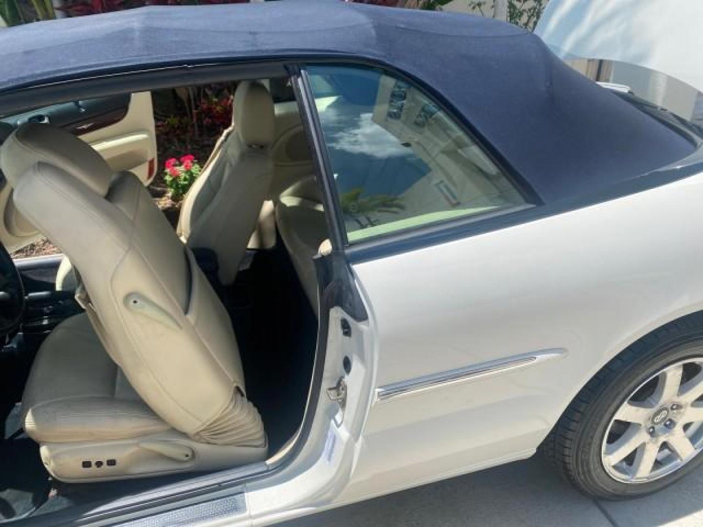 2002 Stone White /Royal Blue/Cream Chrysler Sebring Limited FL LOW MILES 34,440 (1C3EL65R52N) with an 2.7L MFI DOHC 24-Valve V6 Engine engine, Automatic transmission, located at 4701 North Dixie Hwy, Pompano Beach, FL, 33064, (954) 422-2889, 26.240938, -80.123474 - OUR WEBPAGE FLORIDACARS1.COM HAS OVER 100 PHOTOS AND FREE CARFAX LINK 2002 CHRYSLER SEBRING LIMITED VIN: 1C3EL65R52N169318 1 C 3 E L 6 5 R 5 2 N 1 6 9 3 1 8 CONVERTIBLE 2.7L V6 F DOHC GASOLINE FRONT WHEEL DRIVE Top Features Alloy Wheels Soft Top Infinity Sound System Sunroof(s) Leather Seats Basic F - Photo#59