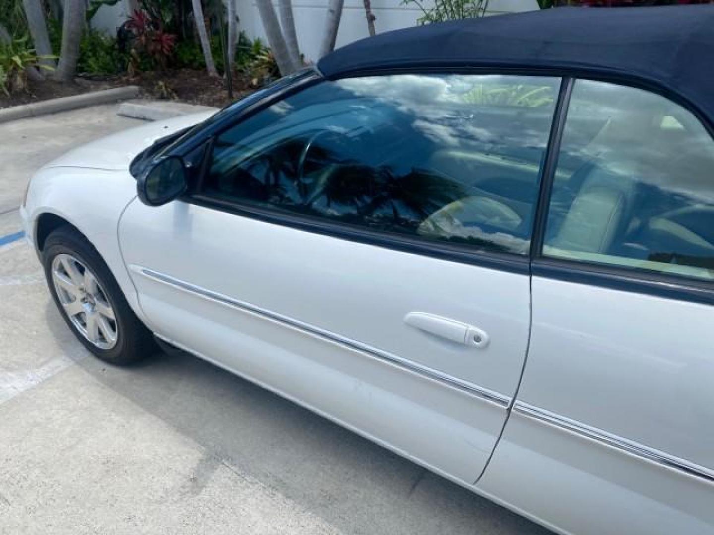 2002 Stone White /Royal Blue/Cream Chrysler Sebring Limited FL LOW MILES 34,440 (1C3EL65R52N) with an 2.7L MFI DOHC 24-Valve V6 Engine engine, Automatic transmission, located at 4701 North Dixie Hwy, Pompano Beach, FL, 33064, (954) 422-2889, 26.240938, -80.123474 - OUR WEBPAGE FLORIDACARS1.COM HAS OVER 100 PHOTOS AND FREE CARFAX LINK 2002 CHRYSLER SEBRING LIMITED VIN: 1C3EL65R52N169318 1 C 3 E L 6 5 R 5 2 N 1 6 9 3 1 8 CONVERTIBLE 2.7L V6 F DOHC GASOLINE FRONT WHEEL DRIVE Top Features Alloy Wheels Soft Top Infinity Sound System Sunroof(s) Leather Seats Basic F - Photo#26
