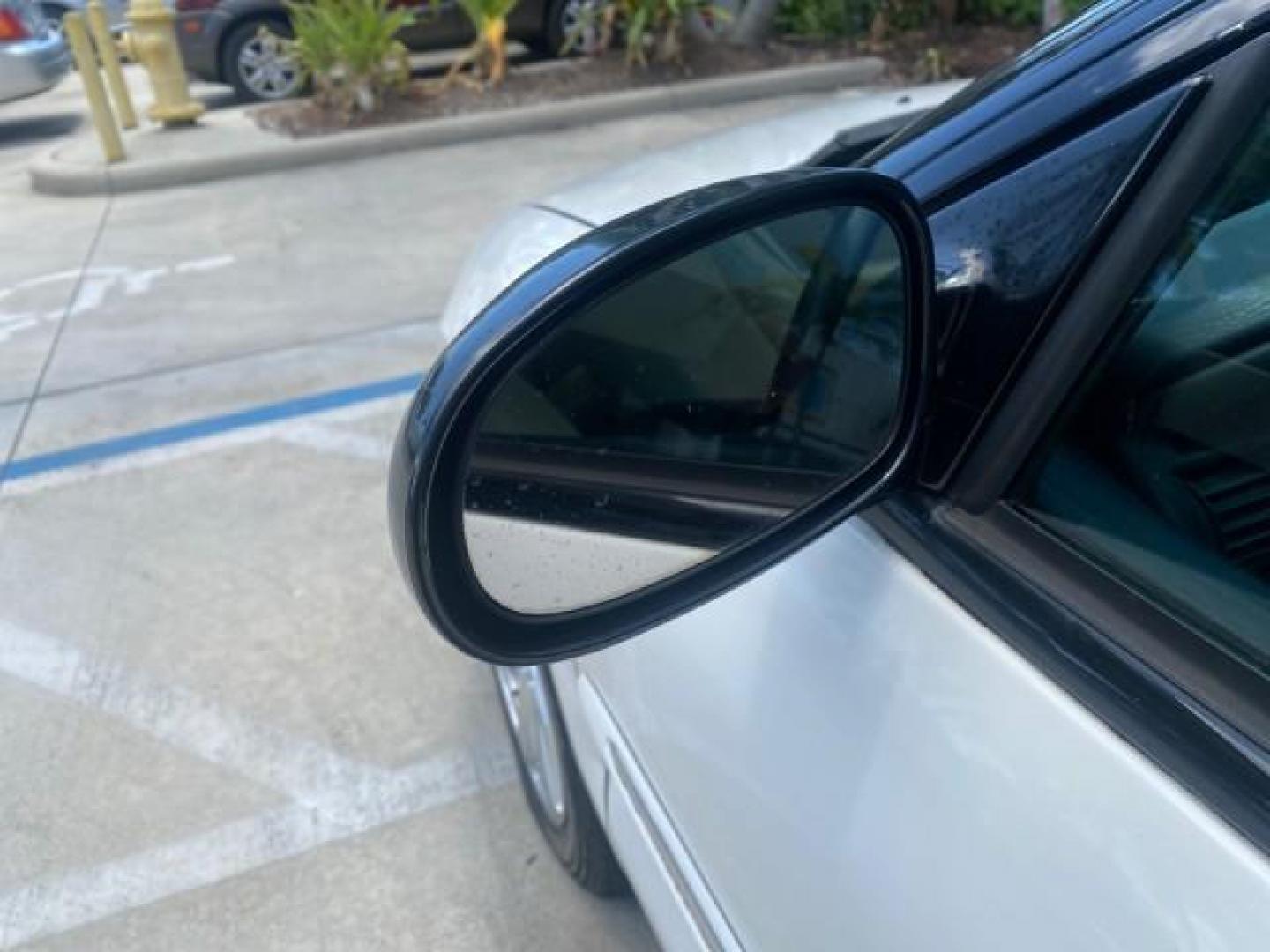 2002 Stone White /Royal Blue/Cream Chrysler Sebring Limited FL LOW MILES 34,440 (1C3EL65R52N) with an 2.7L MFI DOHC 24-Valve V6 Engine engine, Automatic transmission, located at 4701 North Dixie Hwy, Pompano Beach, FL, 33064, (954) 422-2889, 26.240938, -80.123474 - OUR WEBPAGE FLORIDACARS1.COM HAS OVER 100 PHOTOS AND FREE CARFAX LINK 2002 CHRYSLER SEBRING LIMITED VIN: 1C3EL65R52N169318 1 C 3 E L 6 5 R 5 2 N 1 6 9 3 1 8 CONVERTIBLE 2.7L V6 F DOHC GASOLINE FRONT WHEEL DRIVE Top Features Alloy Wheels Soft Top Infinity Sound System Sunroof(s) Leather Seats Basic F - Photo#28