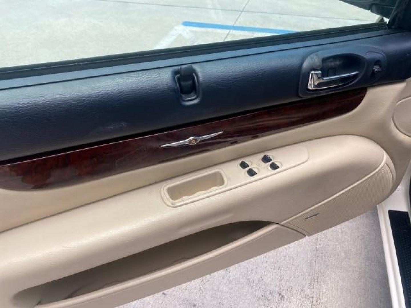 2002 Stone White /Royal Blue/Cream Chrysler Sebring Limited FL LOW MILES 34,440 (1C3EL65R52N) with an 2.7L MFI DOHC 24-Valve V6 Engine engine, Automatic transmission, located at 4701 North Dixie Hwy, Pompano Beach, FL, 33064, (954) 422-2889, 26.240938, -80.123474 - OUR WEBPAGE FLORIDACARS1.COM HAS OVER 100 PHOTOS AND FREE CARFAX LINK 2002 CHRYSLER SEBRING LIMITED VIN: 1C3EL65R52N169318 1 C 3 E L 6 5 R 5 2 N 1 6 9 3 1 8 CONVERTIBLE 2.7L V6 F DOHC GASOLINE FRONT WHEEL DRIVE Top Features Alloy Wheels Soft Top Infinity Sound System Sunroof(s) Leather Seats Basic F - Photo#30