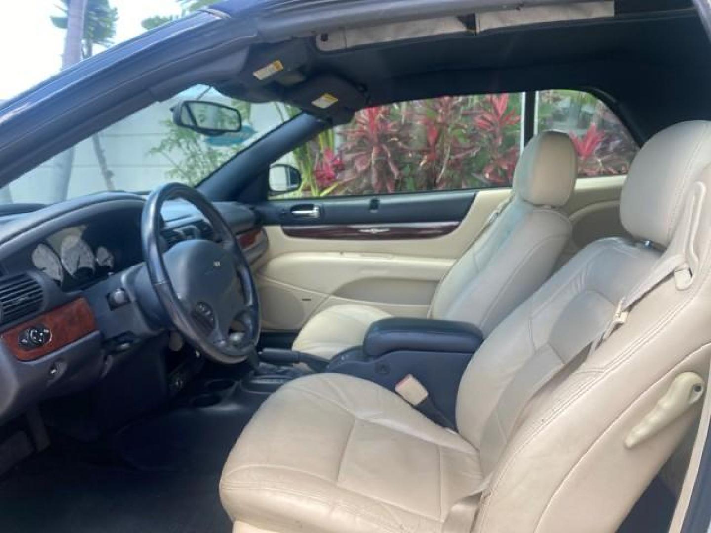 2002 Stone White /Royal Blue/Cream Chrysler Sebring Limited FL LOW MILES 34,440 (1C3EL65R52N) with an 2.7L MFI DOHC 24-Valve V6 Engine engine, Automatic transmission, located at 4701 North Dixie Hwy, Pompano Beach, FL, 33064, (954) 422-2889, 26.240938, -80.123474 - OUR WEBPAGE FLORIDACARS1.COM HAS OVER 100 PHOTOS AND FREE CARFAX LINK 2002 CHRYSLER SEBRING LIMITED VIN: 1C3EL65R52N169318 1 C 3 E L 6 5 R 5 2 N 1 6 9 3 1 8 CONVERTIBLE 2.7L V6 F DOHC GASOLINE FRONT WHEEL DRIVE Top Features Alloy Wheels Soft Top Infinity Sound System Sunroof(s) Leather Seats Basic F - Photo#32