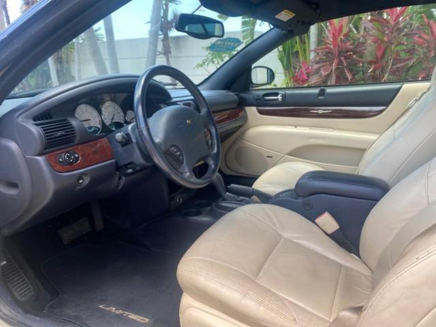 2002 Stone White /Royal Blue/Cream Chrysler Sebring Limited FL LOW MILES 34,440 (1C3EL65R52N) with an 2.7L MFI DOHC 24-Valve V6 Engine engine, Automatic transmission, located at 4701 North Dixie Hwy, Pompano Beach, FL, 33064, (954) 422-2889, 26.240938, -80.123474 - OUR WEBPAGE FLORIDACARS1.COM HAS OVER 100 PHOTOS AND FREE CARFAX LINK 2002 CHRYSLER SEBRING LIMITED VIN: 1C3EL65R52N169318 1 C 3 E L 6 5 R 5 2 N 1 6 9 3 1 8 CONVERTIBLE 2.7L V6 F DOHC GASOLINE FRONT WHEEL DRIVE Top Features Alloy Wheels Soft Top Infinity Sound System Sunroof(s) Leather Seats Basic F - Photo#33