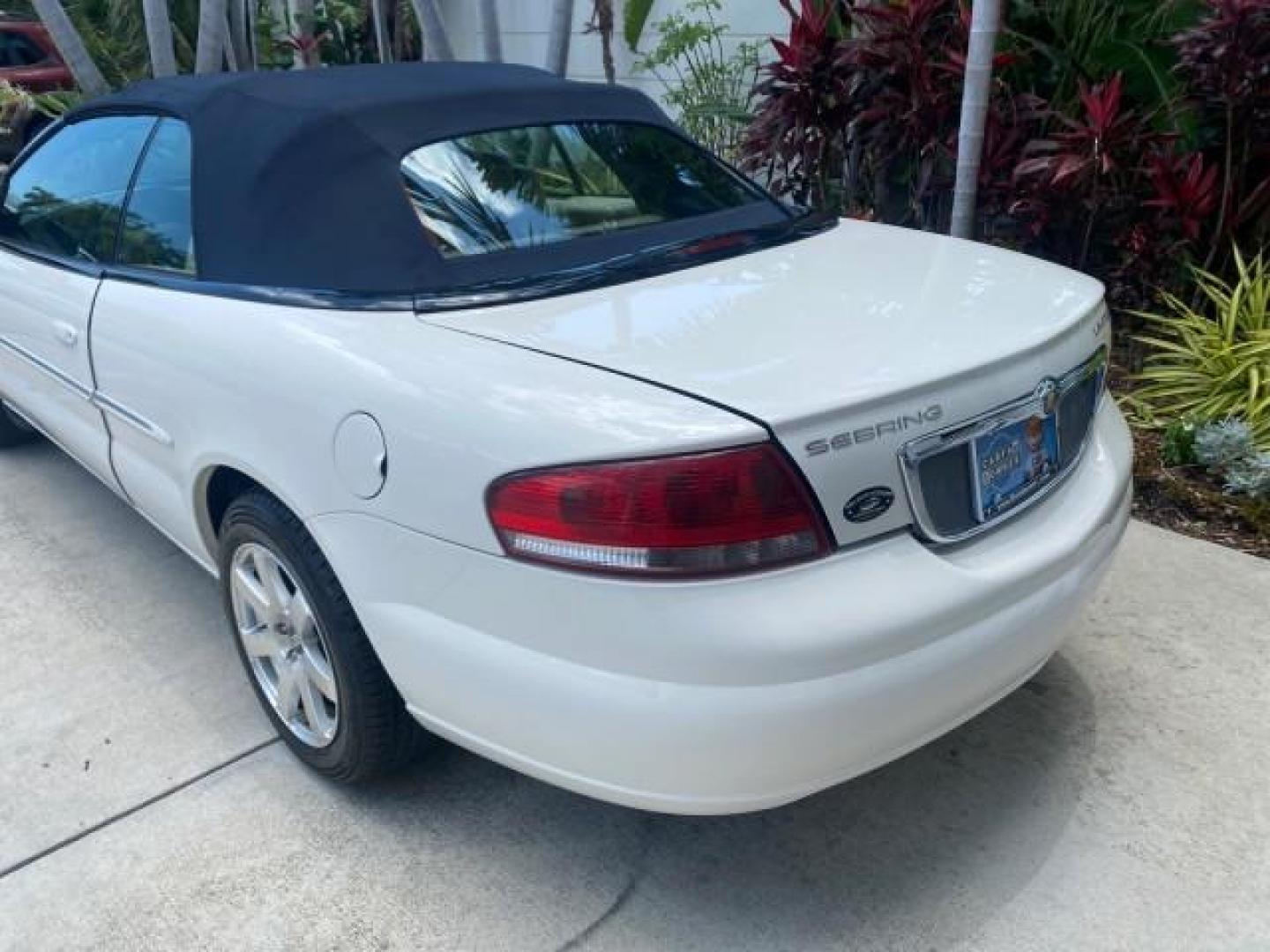2002 Stone White /Royal Blue/Cream Chrysler Sebring Limited FL LOW MILES 34,440 (1C3EL65R52N) with an 2.7L MFI DOHC 24-Valve V6 Engine engine, Automatic transmission, located at 4701 North Dixie Hwy, Pompano Beach, FL, 33064, (954) 422-2889, 26.240938, -80.123474 - OUR WEBPAGE FLORIDACARS1.COM HAS OVER 100 PHOTOS AND FREE CARFAX LINK 2002 CHRYSLER SEBRING LIMITED VIN: 1C3EL65R52N169318 1 C 3 E L 6 5 R 5 2 N 1 6 9 3 1 8 CONVERTIBLE 2.7L V6 F DOHC GASOLINE FRONT WHEEL DRIVE Top Features Alloy Wheels Soft Top Infinity Sound System Sunroof(s) Leather Seats Basic F - Photo#69