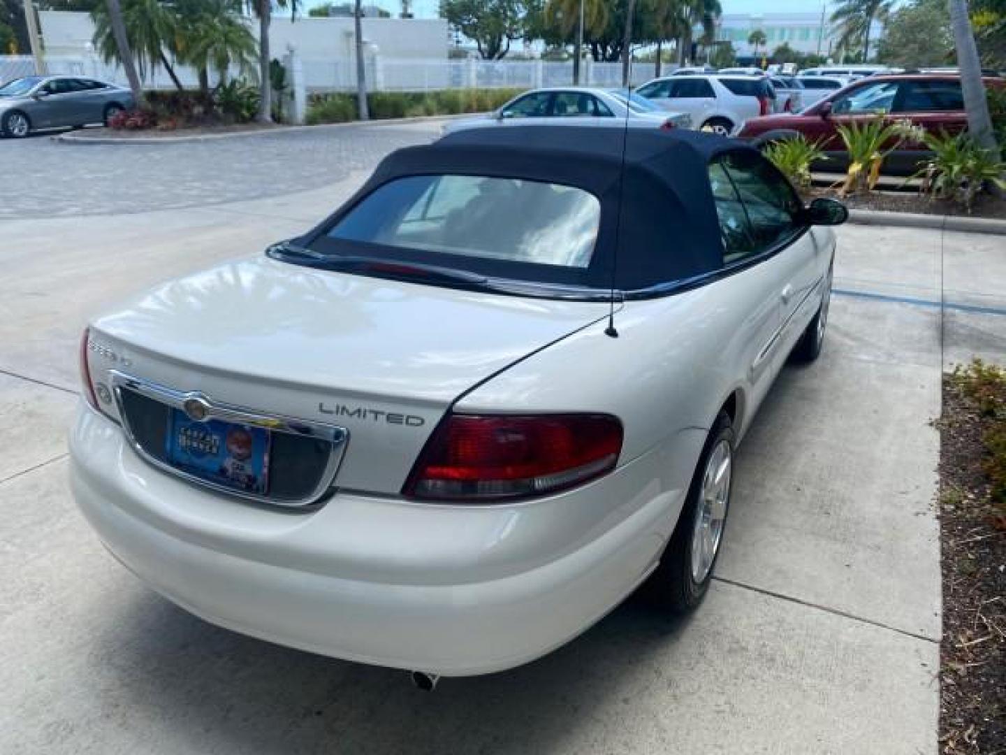 2002 Stone White /Royal Blue/Cream Chrysler Sebring Limited FL LOW MILES 34,440 (1C3EL65R52N) with an 2.7L MFI DOHC 24-Valve V6 Engine engine, Automatic transmission, located at 4701 North Dixie Hwy, Pompano Beach, FL, 33064, (954) 422-2889, 26.240938, -80.123474 - OUR WEBPAGE FLORIDACARS1.COM HAS OVER 100 PHOTOS AND FREE CARFAX LINK 2002 CHRYSLER SEBRING LIMITED VIN: 1C3EL65R52N169318 1 C 3 E L 6 5 R 5 2 N 1 6 9 3 1 8 CONVERTIBLE 2.7L V6 F DOHC GASOLINE FRONT WHEEL DRIVE Top Features Alloy Wheels Soft Top Infinity Sound System Sunroof(s) Leather Seats Basic F - Photo#71