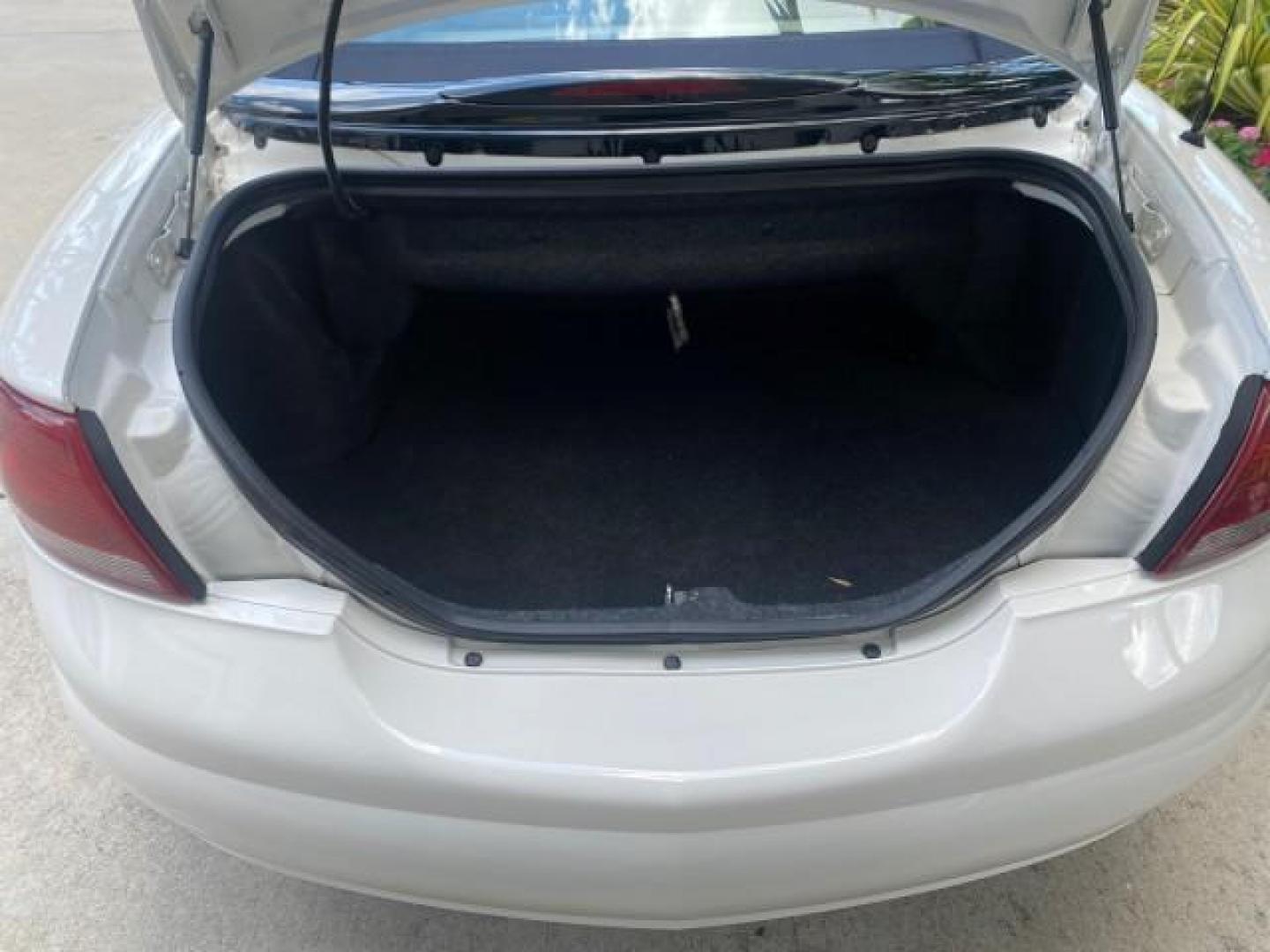2002 Stone White /Royal Blue/Cream Chrysler Sebring Limited FL LOW MILES 34,440 (1C3EL65R52N) with an 2.7L MFI DOHC 24-Valve V6 Engine engine, Automatic transmission, located at 4701 North Dixie Hwy, Pompano Beach, FL, 33064, (954) 422-2889, 26.240938, -80.123474 - OUR WEBPAGE FLORIDACARS1.COM HAS OVER 100 PHOTOS AND FREE CARFAX LINK 2002 CHRYSLER SEBRING LIMITED VIN: 1C3EL65R52N169318 1 C 3 E L 6 5 R 5 2 N 1 6 9 3 1 8 CONVERTIBLE 2.7L V6 F DOHC GASOLINE FRONT WHEEL DRIVE Top Features Alloy Wheels Soft Top Infinity Sound System Sunroof(s) Leather Seats Basic F - Photo#73