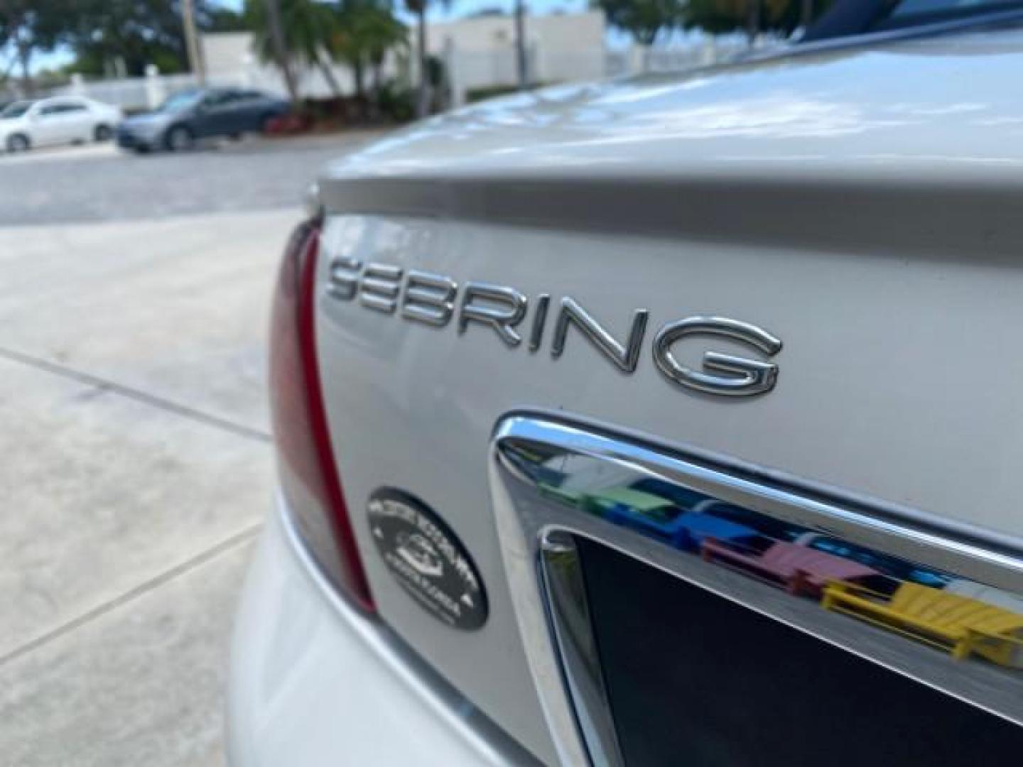 2002 Stone White /Royal Blue/Cream Chrysler Sebring Limited FL LOW MILES 34,440 (1C3EL65R52N) with an 2.7L MFI DOHC 24-Valve V6 Engine engine, Automatic transmission, located at 4701 North Dixie Hwy, Pompano Beach, FL, 33064, (954) 422-2889, 26.240938, -80.123474 - OUR WEBPAGE FLORIDACARS1.COM HAS OVER 100 PHOTOS AND FREE CARFAX LINK 2002 CHRYSLER SEBRING LIMITED VIN: 1C3EL65R52N169318 1 C 3 E L 6 5 R 5 2 N 1 6 9 3 1 8 CONVERTIBLE 2.7L V6 F DOHC GASOLINE FRONT WHEEL DRIVE Top Features Alloy Wheels Soft Top Infinity Sound System Sunroof(s) Leather Seats Basic F - Photo#75