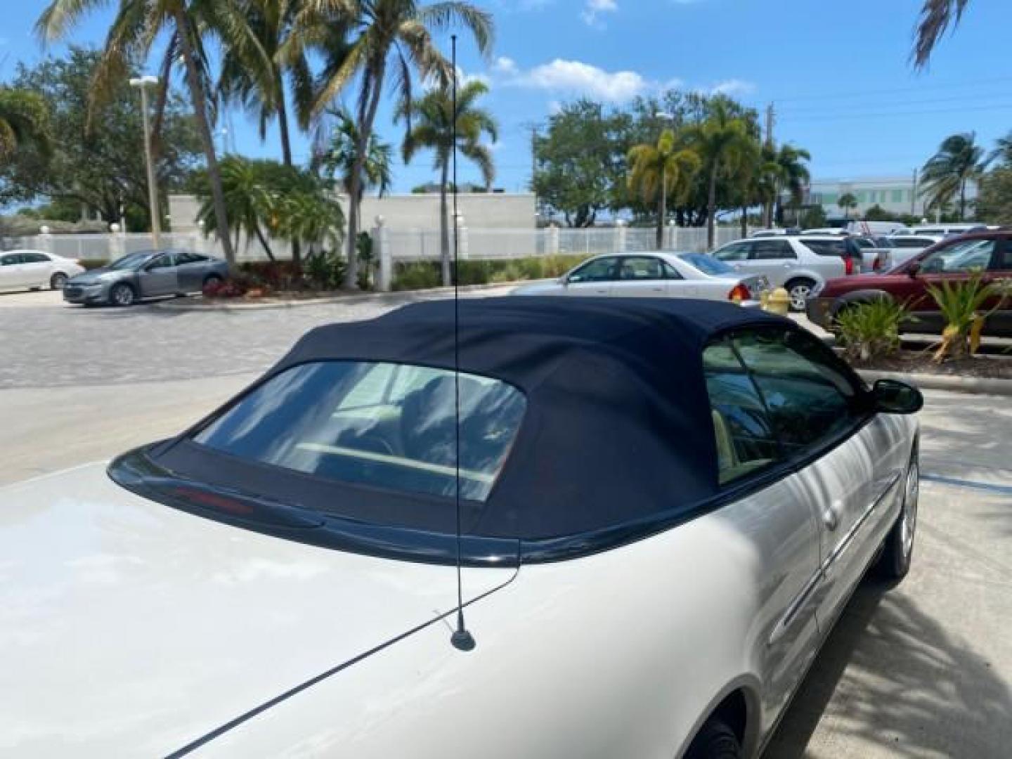2002 Stone White /Royal Blue/Cream Chrysler Sebring Limited FL LOW MILES 34,440 (1C3EL65R52N) with an 2.7L MFI DOHC 24-Valve V6 Engine engine, Automatic transmission, located at 4701 North Dixie Hwy, Pompano Beach, FL, 33064, (954) 422-2889, 26.240938, -80.123474 - OUR WEBPAGE FLORIDACARS1.COM HAS OVER 100 PHOTOS AND FREE CARFAX LINK 2002 CHRYSLER SEBRING LIMITED VIN: 1C3EL65R52N169318 1 C 3 E L 6 5 R 5 2 N 1 6 9 3 1 8 CONVERTIBLE 2.7L V6 F DOHC GASOLINE FRONT WHEEL DRIVE Top Features Alloy Wheels Soft Top Infinity Sound System Sunroof(s) Leather Seats Basic F - Photo#78
