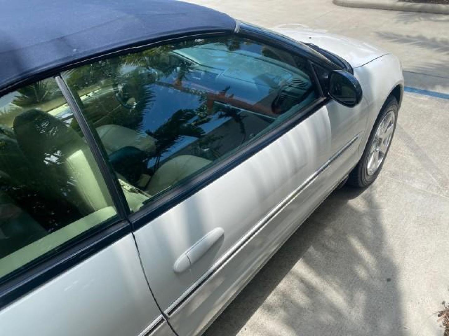 2002 Stone White /Royal Blue/Cream Chrysler Sebring Limited FL LOW MILES 34,440 (1C3EL65R52N) with an 2.7L MFI DOHC 24-Valve V6 Engine engine, Automatic transmission, located at 4701 North Dixie Hwy, Pompano Beach, FL, 33064, (954) 422-2889, 26.240938, -80.123474 - OUR WEBPAGE FLORIDACARS1.COM HAS OVER 100 PHOTOS AND FREE CARFAX LINK 2002 CHRYSLER SEBRING LIMITED VIN: 1C3EL65R52N169318 1 C 3 E L 6 5 R 5 2 N 1 6 9 3 1 8 CONVERTIBLE 2.7L V6 F DOHC GASOLINE FRONT WHEEL DRIVE Top Features Alloy Wheels Soft Top Infinity Sound System Sunroof(s) Leather Seats Basic F - Photo#82