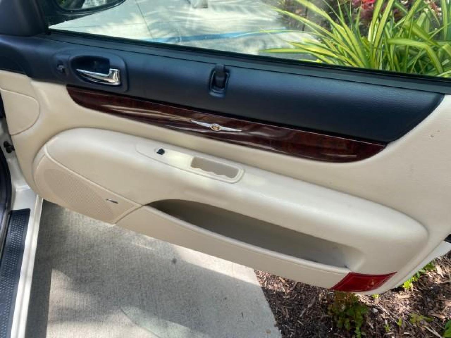 2002 Stone White /Royal Blue/Cream Chrysler Sebring Limited FL LOW MILES 34,440 (1C3EL65R52N) with an 2.7L MFI DOHC 24-Valve V6 Engine engine, Automatic transmission, located at 4701 North Dixie Hwy, Pompano Beach, FL, 33064, (954) 422-2889, 26.240938, -80.123474 - OUR WEBPAGE FLORIDACARS1.COM HAS OVER 100 PHOTOS AND FREE CARFAX LINK 2002 CHRYSLER SEBRING LIMITED VIN: 1C3EL65R52N169318 1 C 3 E L 6 5 R 5 2 N 1 6 9 3 1 8 CONVERTIBLE 2.7L V6 F DOHC GASOLINE FRONT WHEEL DRIVE Top Features Alloy Wheels Soft Top Infinity Sound System Sunroof(s) Leather Seats Basic F - Photo#84