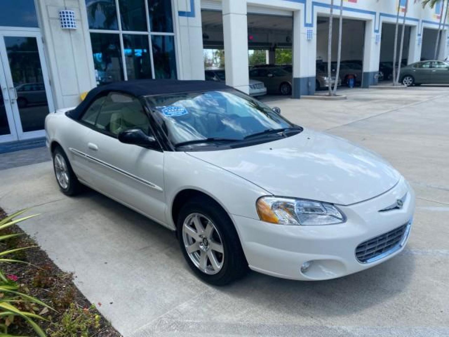 2002 Stone White /Royal Blue/Cream Chrysler Sebring Limited FL LOW MILES 34,440 (1C3EL65R52N) with an 2.7L MFI DOHC 24-Valve V6 Engine engine, Automatic transmission, located at 4701 North Dixie Hwy, Pompano Beach, FL, 33064, (954) 422-2889, 26.240938, -80.123474 - OUR WEBPAGE FLORIDACARS1.COM HAS OVER 100 PHOTOS AND FREE CARFAX LINK 2002 CHRYSLER SEBRING LIMITED VIN: 1C3EL65R52N169318 1 C 3 E L 6 5 R 5 2 N 1 6 9 3 1 8 CONVERTIBLE 2.7L V6 F DOHC GASOLINE FRONT WHEEL DRIVE Top Features Alloy Wheels Soft Top Infinity Sound System Sunroof(s) Leather Seats Basic F - Photo#96