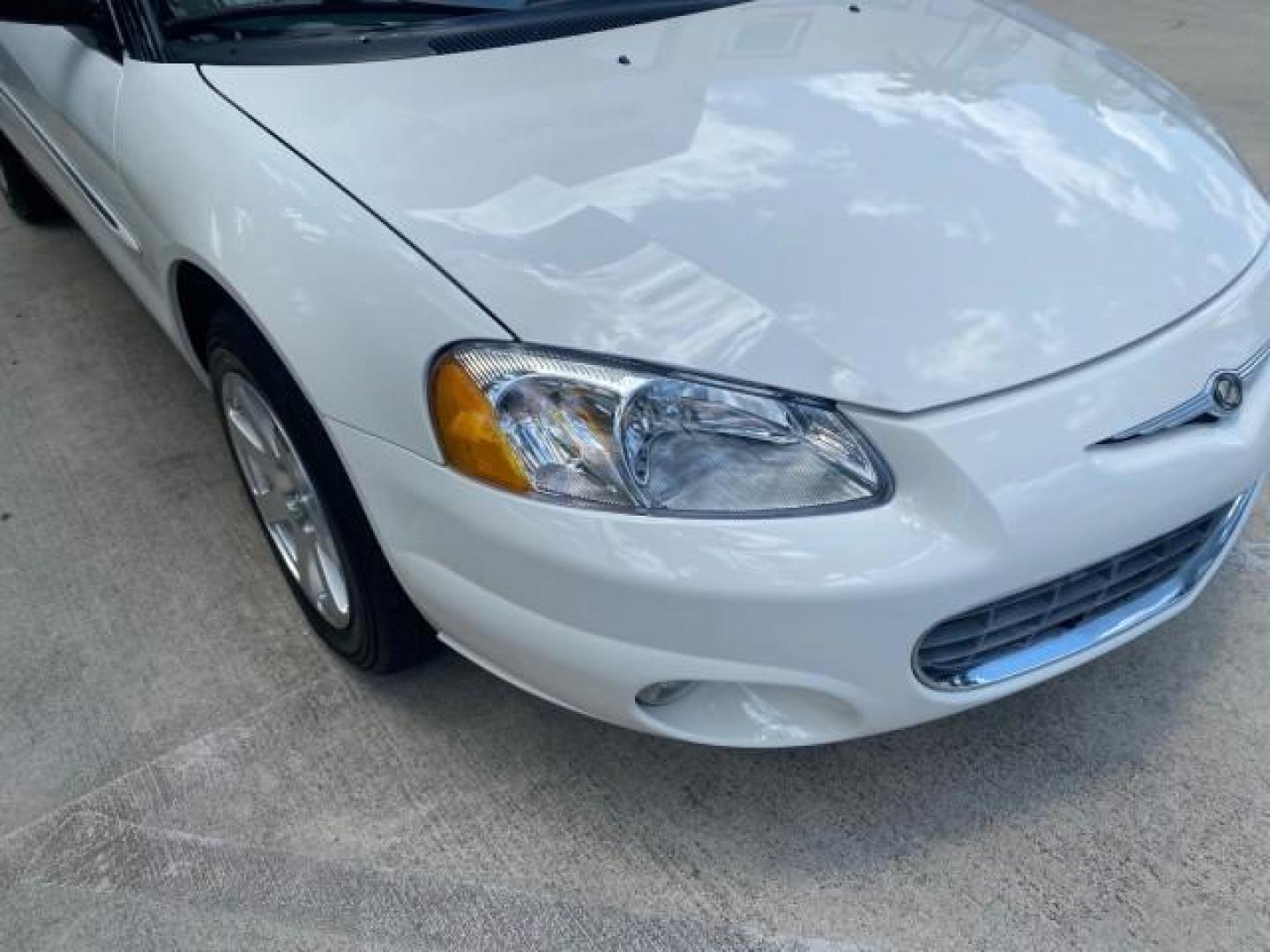 2002 Stone White /Royal Blue/Cream Chrysler Sebring Limited FL LOW MILES 34,440 (1C3EL65R52N) with an 2.7L MFI DOHC 24-Valve V6 Engine engine, Automatic transmission, located at 4701 North Dixie Hwy, Pompano Beach, FL, 33064, (954) 422-2889, 26.240938, -80.123474 - OUR WEBPAGE FLORIDACARS1.COM HAS OVER 100 PHOTOS AND FREE CARFAX LINK 2002 CHRYSLER SEBRING LIMITED VIN: 1C3EL65R52N169318 1 C 3 E L 6 5 R 5 2 N 1 6 9 3 1 8 CONVERTIBLE 2.7L V6 F DOHC GASOLINE FRONT WHEEL DRIVE Top Features Alloy Wheels Soft Top Infinity Sound System Sunroof(s) Leather Seats Basic F - Photo#99
