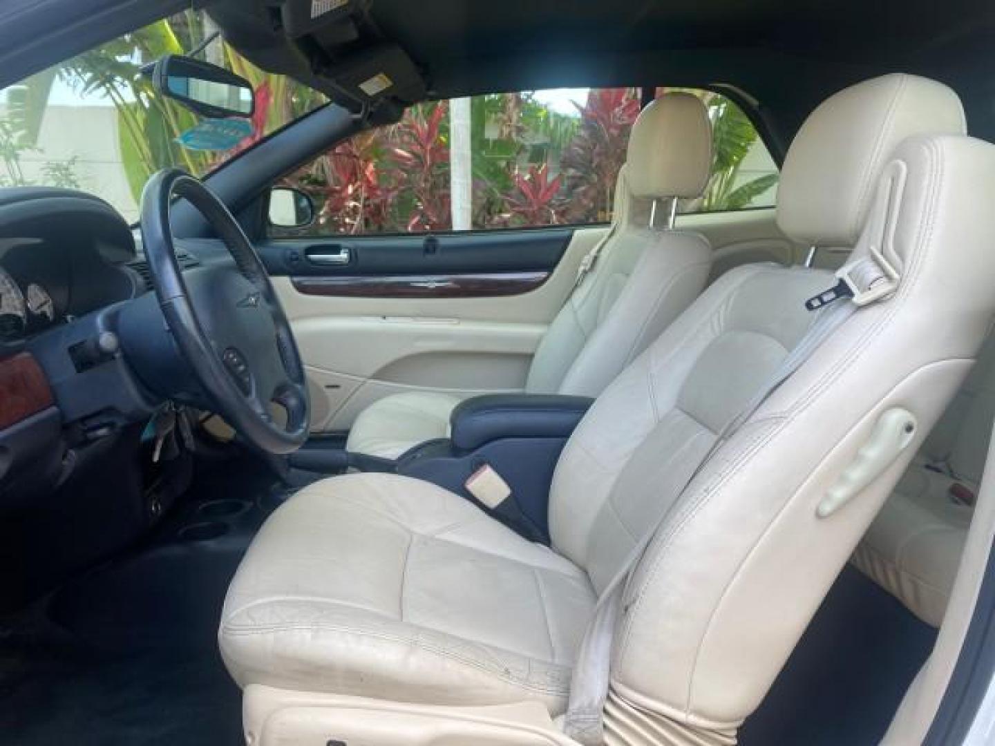 2002 Stone White /Royal Blue/Cream Chrysler Sebring Limited FL LOW MILES 34,440 (1C3EL65R52N) with an 2.7L MFI DOHC 24-Valve V6 Engine engine, Automatic transmission, located at 4701 North Dixie Hwy, Pompano Beach, FL, 33064, (954) 422-2889, 26.240938, -80.123474 - OUR WEBPAGE FLORIDACARS1.COM HAS OVER 100 PHOTOS AND FREE CARFAX LINK 2002 CHRYSLER SEBRING LIMITED VIN: 1C3EL65R52N169318 1 C 3 E L 6 5 R 5 2 N 1 6 9 3 1 8 CONVERTIBLE 2.7L V6 F DOHC GASOLINE FRONT WHEEL DRIVE Top Features Alloy Wheels Soft Top Infinity Sound System Sunroof(s) Leather Seats Basic F - Photo#31