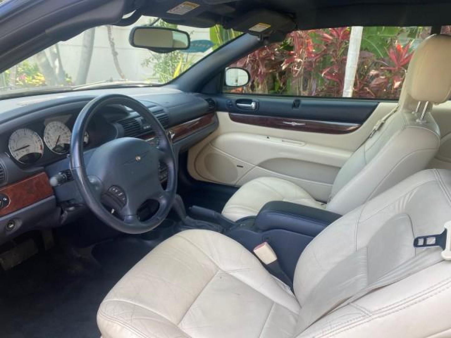 2002 Stone White /Royal Blue/Cream Chrysler Sebring Limited FL LOW MILES 34,440 (1C3EL65R52N) with an 2.7L MFI DOHC 24-Valve V6 Engine engine, Automatic transmission, located at 4701 North Dixie Hwy, Pompano Beach, FL, 33064, (954) 422-2889, 26.240938, -80.123474 - OUR WEBPAGE FLORIDACARS1.COM HAS OVER 100 PHOTOS AND FREE CARFAX LINK 2002 CHRYSLER SEBRING LIMITED VIN: 1C3EL65R52N169318 1 C 3 E L 6 5 R 5 2 N 1 6 9 3 1 8 CONVERTIBLE 2.7L V6 F DOHC GASOLINE FRONT WHEEL DRIVE Top Features Alloy Wheels Soft Top Infinity Sound System Sunroof(s) Leather Seats Basic F - Photo#34