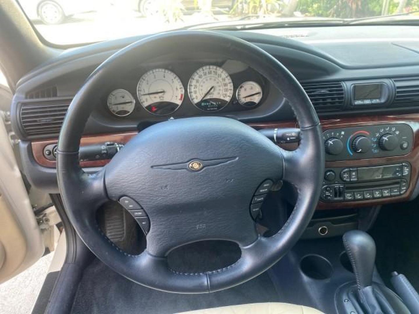 2002 Stone White /Royal Blue/Cream Chrysler Sebring Limited FL LOW MILES 34,440 (1C3EL65R52N) with an 2.7L MFI DOHC 24-Valve V6 Engine engine, Automatic transmission, located at 4701 North Dixie Hwy, Pompano Beach, FL, 33064, (954) 422-2889, 26.240938, -80.123474 - OUR WEBPAGE FLORIDACARS1.COM HAS OVER 100 PHOTOS AND FREE CARFAX LINK 2002 CHRYSLER SEBRING LIMITED VIN: 1C3EL65R52N169318 1 C 3 E L 6 5 R 5 2 N 1 6 9 3 1 8 CONVERTIBLE 2.7L V6 F DOHC GASOLINE FRONT WHEEL DRIVE Top Features Alloy Wheels Soft Top Infinity Sound System Sunroof(s) Leather Seats Basic F - Photo#37