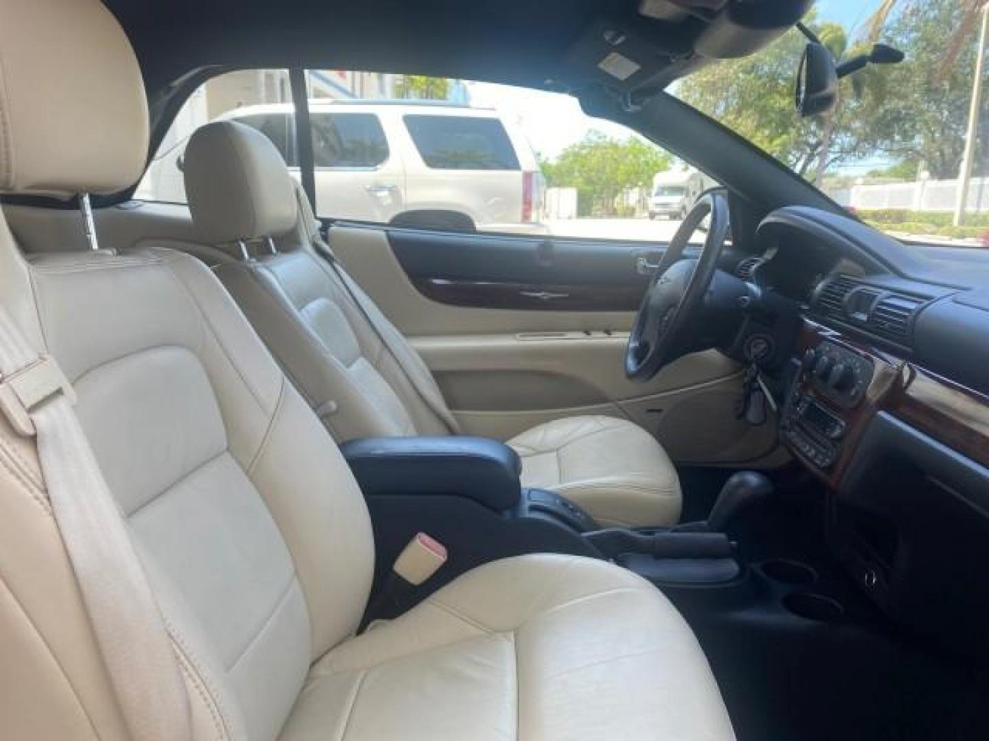 2002 Stone White /Royal Blue/Cream Chrysler Sebring Limited FL LOW MILES 34,440 (1C3EL65R52N) with an 2.7L MFI DOHC 24-Valve V6 Engine engine, Automatic transmission, located at 4701 North Dixie Hwy, Pompano Beach, FL, 33064, (954) 422-2889, 26.240938, -80.123474 - OUR WEBPAGE FLORIDACARS1.COM HAS OVER 100 PHOTOS AND FREE CARFAX LINK 2002 CHRYSLER SEBRING LIMITED VIN: 1C3EL65R52N169318 1 C 3 E L 6 5 R 5 2 N 1 6 9 3 1 8 CONVERTIBLE 2.7L V6 F DOHC GASOLINE FRONT WHEEL DRIVE Top Features Alloy Wheels Soft Top Infinity Sound System Sunroof(s) Leather Seats Basic F - Photo#85
