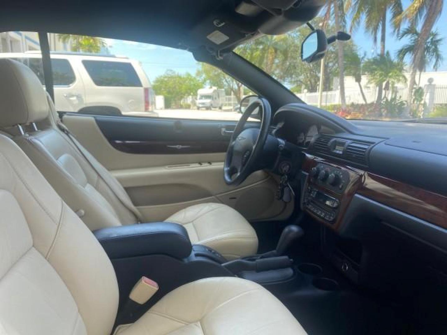 2002 Stone White /Royal Blue/Cream Chrysler Sebring Limited FL LOW MILES 34,440 (1C3EL65R52N) with an 2.7L MFI DOHC 24-Valve V6 Engine engine, Automatic transmission, located at 4701 North Dixie Hwy, Pompano Beach, FL, 33064, (954) 422-2889, 26.240938, -80.123474 - OUR WEBPAGE FLORIDACARS1.COM HAS OVER 100 PHOTOS AND FREE CARFAX LINK 2002 CHRYSLER SEBRING LIMITED VIN: 1C3EL65R52N169318 1 C 3 E L 6 5 R 5 2 N 1 6 9 3 1 8 CONVERTIBLE 2.7L V6 F DOHC GASOLINE FRONT WHEEL DRIVE Top Features Alloy Wheels Soft Top Infinity Sound System Sunroof(s) Leather Seats Basic F - Photo#87