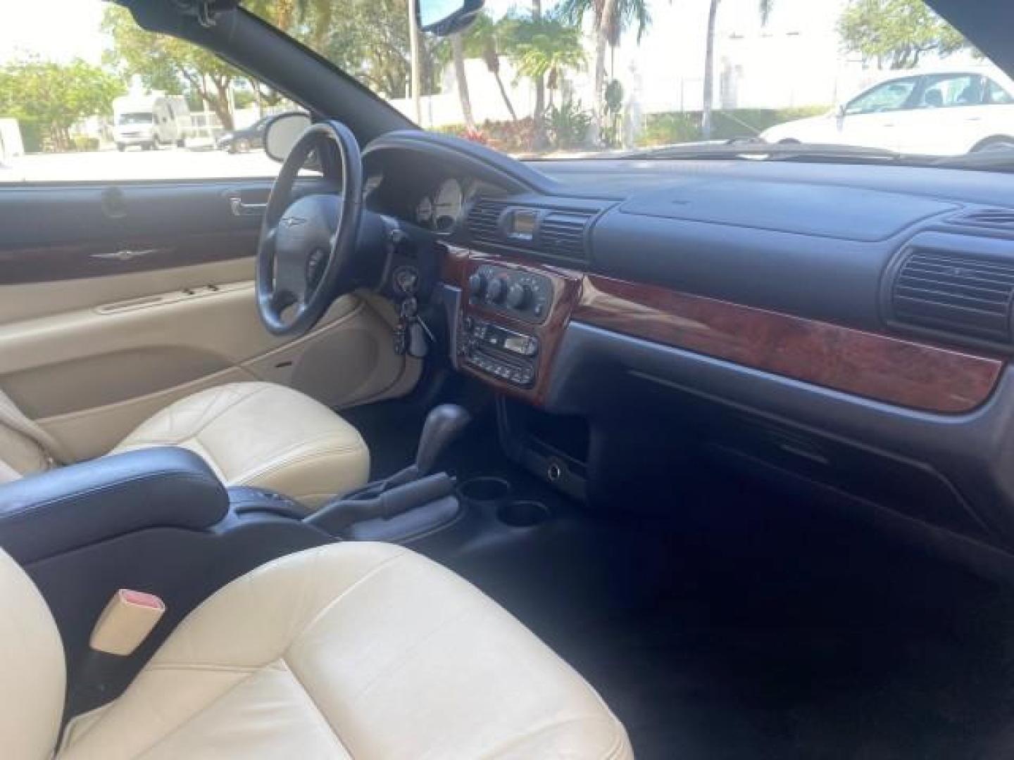 2002 Stone White /Royal Blue/Cream Chrysler Sebring Limited FL LOW MILES 34,440 (1C3EL65R52N) with an 2.7L MFI DOHC 24-Valve V6 Engine engine, Automatic transmission, located at 4701 North Dixie Hwy, Pompano Beach, FL, 33064, (954) 422-2889, 26.240938, -80.123474 - OUR WEBPAGE FLORIDACARS1.COM HAS OVER 100 PHOTOS AND FREE CARFAX LINK 2002 CHRYSLER SEBRING LIMITED VIN: 1C3EL65R52N169318 1 C 3 E L 6 5 R 5 2 N 1 6 9 3 1 8 CONVERTIBLE 2.7L V6 F DOHC GASOLINE FRONT WHEEL DRIVE Top Features Alloy Wheels Soft Top Infinity Sound System Sunroof(s) Leather Seats Basic F - Photo#88