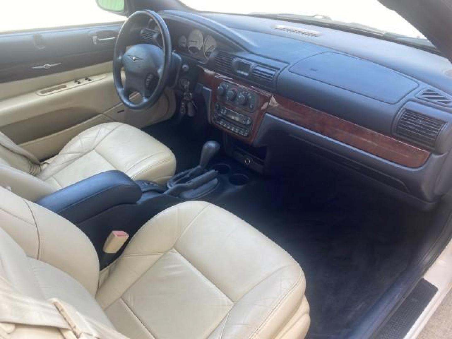 2002 Stone White /Royal Blue/Cream Chrysler Sebring Limited FL LOW MILES 34,440 (1C3EL65R52N) with an 2.7L MFI DOHC 24-Valve V6 Engine engine, Automatic transmission, located at 4701 North Dixie Hwy, Pompano Beach, FL, 33064, (954) 422-2889, 26.240938, -80.123474 - OUR WEBPAGE FLORIDACARS1.COM HAS OVER 100 PHOTOS AND FREE CARFAX LINK 2002 CHRYSLER SEBRING LIMITED VIN: 1C3EL65R52N169318 1 C 3 E L 6 5 R 5 2 N 1 6 9 3 1 8 CONVERTIBLE 2.7L V6 F DOHC GASOLINE FRONT WHEEL DRIVE Top Features Alloy Wheels Soft Top Infinity Sound System Sunroof(s) Leather Seats Basic F - Photo#89
