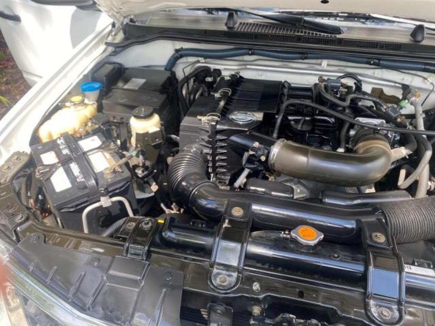 2006 Avalanche /Steel Nissan Frontier XE LOW MILES NO ACCIDENTS (1N6BD06TX6C) with an 2.5L DOHC 16-Valve 4-Cyl Engine engine, Automatic transmission, located at 4701 North Dixie Hwy, Pompano Beach, FL, 33064, (954) 422-2889, 26.240938, -80.123474 - OUR WEBPAGE FLORIDACARS1.COM HAS OVER 100 PHOTOS AND FREE CARFAX LINK 2006 NISSAN FRONTIER XE VIN: 1N6BD06TX6C402109 1 N 6 B D 0 6 T X 6 C 4 0 2 1 0 9 CLUB CAB PICKUP 4 DR 2.5L I4 F DOHC 16V 4 CYL 24 MPG GASOLINE REAR WHEEL DRIVE Top Features Bed Liner Tow Hitch Cloth Seats Basic Features ABS Brakes - Photo#25