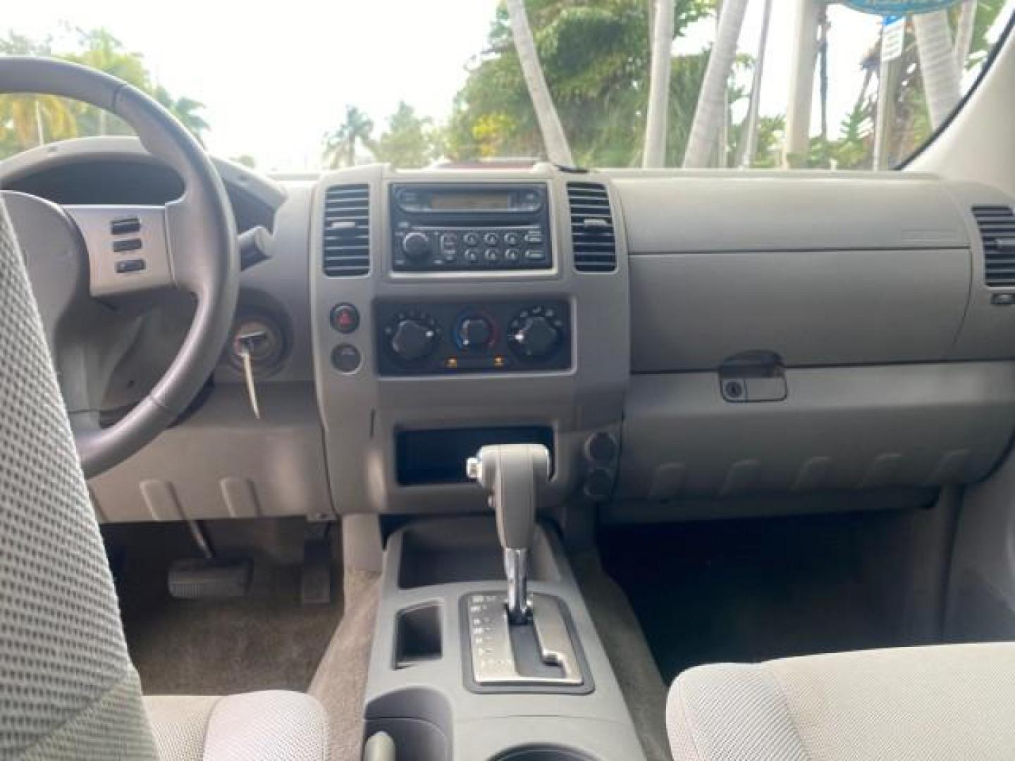 2006 Avalanche /Steel Nissan Frontier XE LOW MILES NO ACCIDENTS (1N6BD06TX6C) with an 2.5L DOHC 16-Valve 4-Cyl Engine engine, Automatic transmission, located at 4701 North Dixie Hwy, Pompano Beach, FL, 33064, (954) 422-2889, 26.240938, -80.123474 - OUR WEBPAGE FLORIDACARS1.COM HAS OVER 100 PHOTOS AND FREE CARFAX LINK 2006 NISSAN FRONTIER XE VIN: 1N6BD06TX6C402109 1 N 6 B D 0 6 T X 6 C 4 0 2 1 0 9 CLUB CAB PICKUP 4 DR 2.5L I4 F DOHC 16V 4 CYL 24 MPG GASOLINE REAR WHEEL DRIVE Top Features Bed Liner Tow Hitch Cloth Seats Basic Features ABS Brakes - Photo#60