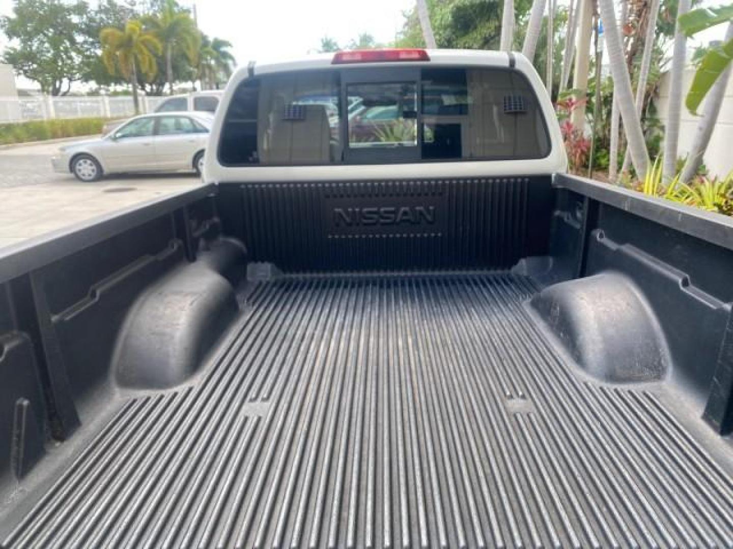 2006 Avalanche /Steel Nissan Frontier XE LOW MILES NO ACCIDENTS (1N6BD06TX6C) with an 2.5L DOHC 16-Valve 4-Cyl Engine engine, Automatic transmission, located at 4701 North Dixie Hwy, Pompano Beach, FL, 33064, (954) 422-2889, 26.240938, -80.123474 - OUR WEBPAGE FLORIDACARS1.COM HAS OVER 100 PHOTOS AND FREE CARFAX LINK 2006 NISSAN FRONTIER XE VIN: 1N6BD06TX6C402109 1 N 6 B D 0 6 T X 6 C 4 0 2 1 0 9 CLUB CAB PICKUP 4 DR 2.5L I4 F DOHC 16V 4 CYL 24 MPG GASOLINE REAR WHEEL DRIVE Top Features Bed Liner Tow Hitch Cloth Seats Basic Features ABS Brakes - Photo#81