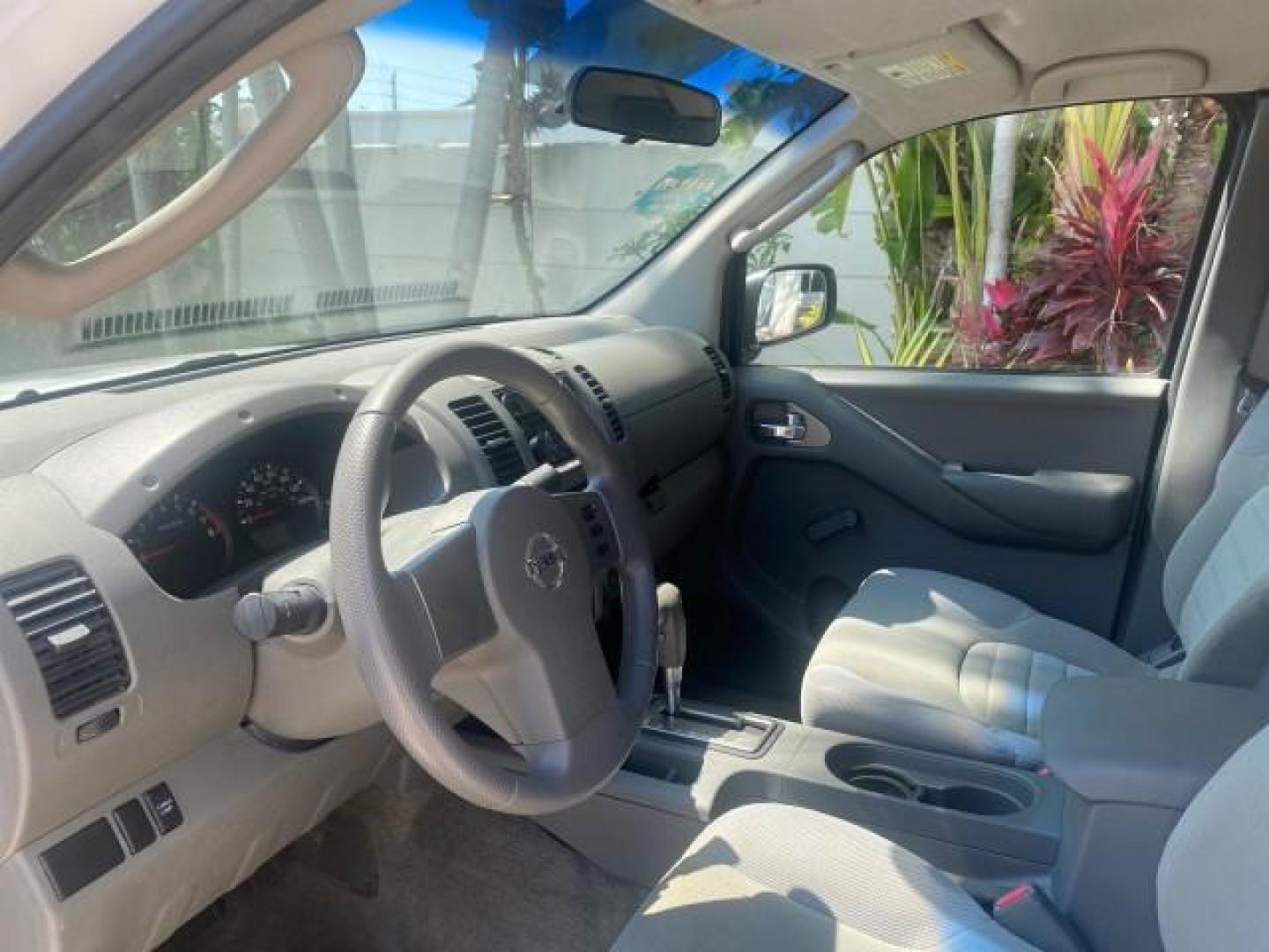 2006 Avalanche /Steel Nissan Frontier XE LOW MILES NO ACCIDENTS (1N6BD06TX6C) with an 2.5L DOHC 16-Valve 4-Cyl Engine engine, Automatic transmission, located at 4701 North Dixie Hwy, Pompano Beach, FL, 33064, (954) 422-2889, 26.240938, -80.123474 - OUR WEBPAGE FLORIDACARS1.COM HAS OVER 100 PHOTOS AND FREE CARFAX LINK 2006 NISSAN FRONTIER XE VIN: 1N6BD06TX6C402109 1 N 6 B D 0 6 T X 6 C 4 0 2 1 0 9 CLUB CAB PICKUP 4 DR 2.5L I4 F DOHC 16V 4 CYL 24 MPG GASOLINE REAR WHEEL DRIVE Top Features Bed Liner Tow Hitch Cloth Seats Basic Features ABS Brakes - Photo#36