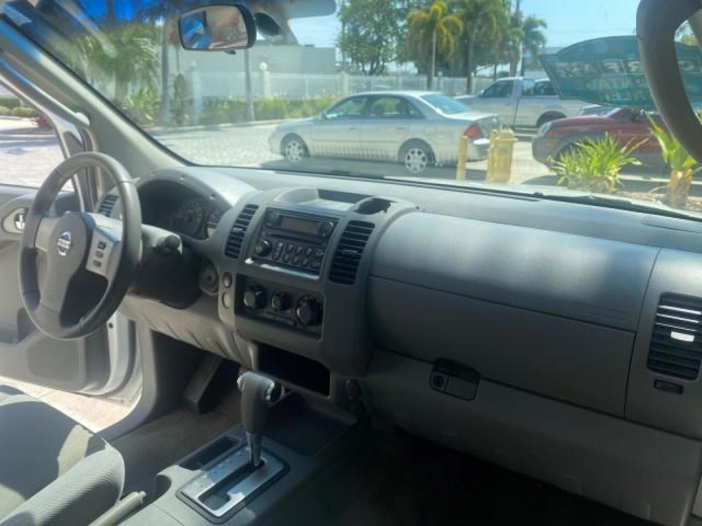 2006 Avalanche /Steel Nissan Frontier XE LOW MILES NO ACCIDENTS (1N6BD06TX6C) with an 2.5L DOHC 16-Valve 4-Cyl Engine engine, Automatic transmission, located at 4701 North Dixie Hwy, Pompano Beach, FL, 33064, (954) 422-2889, 26.240938, -80.123474 - OUR WEBPAGE FLORIDACARS1.COM HAS OVER 100 PHOTOS AND FREE CARFAX LINK 2006 NISSAN FRONTIER XE VIN: 1N6BD06TX6C402109 1 N 6 B D 0 6 T X 6 C 4 0 2 1 0 9 CLUB CAB PICKUP 4 DR 2.5L I4 F DOHC 16V 4 CYL 24 MPG GASOLINE REAR WHEEL DRIVE Top Features Bed Liner Tow Hitch Cloth Seats Basic Features ABS Brakes - Photo#94