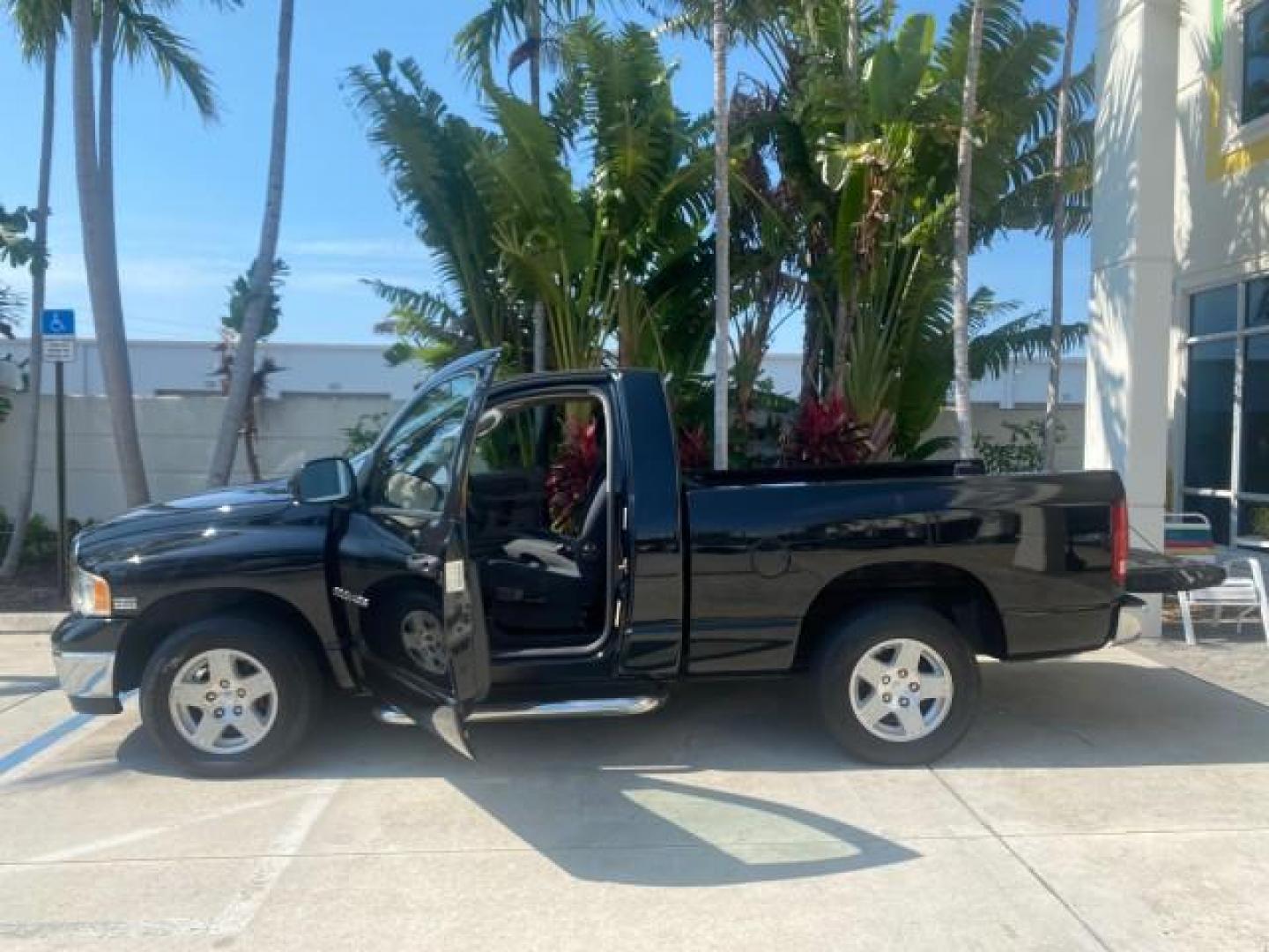 2005 Black /Dark Slate Gray Dodge Ram 1500 SLT 1 OWNER FL LOW MILES 52,299 (1D7HA16D35J) with an 5.7L V8 Hemi Magnum Engine engine, Automatic transmission, located at 4701 North Dixie Hwy, Pompano Beach, FL, 33064, (954) 422-2889, 26.240938, -80.123474 - OUR WEBPAGE FLORIDACARS1.COM HAS OVER 100 PHOTOS AND FREE CARFAX LINK 2005 DODGE RAM 1500 SLT 1 OWNER FLORIDA LIKE NEW! VIN: 1D7HA16D35J624608 1 D 7 H A 1 6 D 3 5 J 6 2 4 6 0 8 PICKUP 5.7L V8 F HEMI 5.7 V8 GASOLINE REAR WHEEL DRIVE Top Features Alloy Wheels Bed Liner Cloth Seats Basic Features ABS B - Photo#8