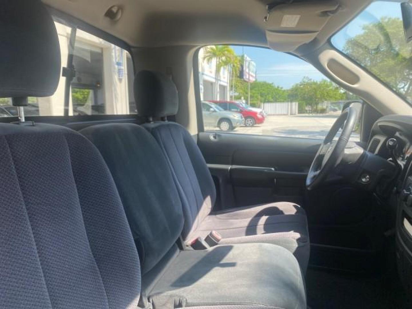 2005 Black /Dark Slate Gray Dodge Ram 1500 SLT 1 OWNER FL LOW MILES 52,299 (1D7HA16D35J) with an 5.7L V8 Hemi Magnum Engine engine, Automatic transmission, located at 4701 North Dixie Hwy, Pompano Beach, FL, 33064, (954) 422-2889, 26.240938, -80.123474 - OUR WEBPAGE FLORIDACARS1.COM HAS OVER 100 PHOTOS AND FREE CARFAX LINK 2005 DODGE RAM 1500 SLT 1 OWNER FLORIDA LIKE NEW! VIN: 1D7HA16D35J624608 1 D 7 H A 1 6 D 3 5 J 6 2 4 6 0 8 PICKUP 5.7L V8 F HEMI 5.7 V8 GASOLINE REAR WHEEL DRIVE Top Features Alloy Wheels Bed Liner Cloth Seats Basic Features ABS B - Photo#12