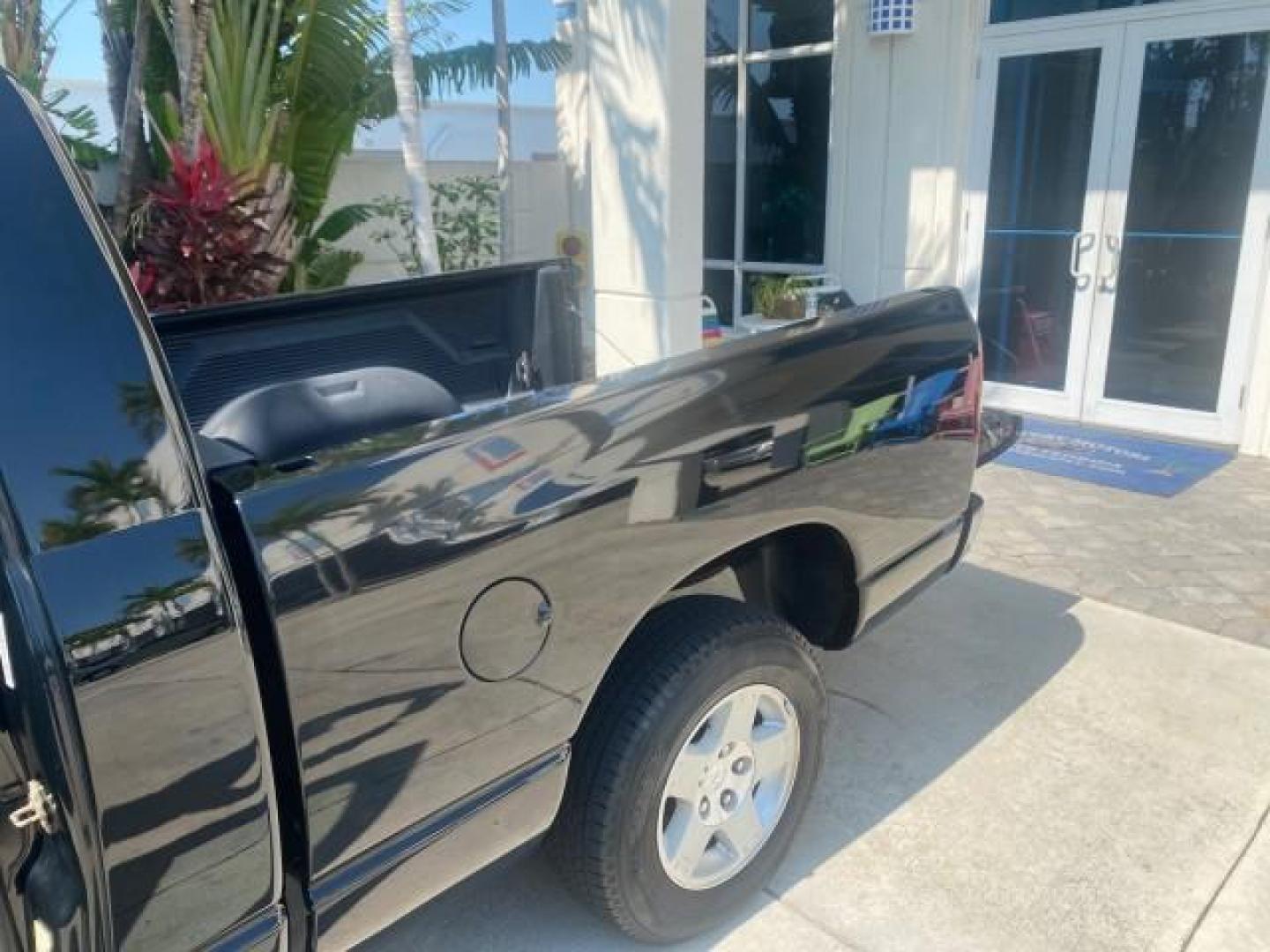 2005 Black /Dark Slate Gray Dodge Ram 1500 SLT 1 OWNER FL LOW MILES 52,299 (1D7HA16D35J) with an 5.7L V8 Hemi Magnum Engine engine, Automatic transmission, located at 4701 North Dixie Hwy, Pompano Beach, FL, 33064, (954) 422-2889, 26.240938, -80.123474 - OUR WEBPAGE FLORIDACARS1.COM HAS OVER 100 PHOTOS AND FREE CARFAX LINK 2005 DODGE RAM 1500 SLT 1 OWNER FLORIDA LIKE NEW! VIN: 1D7HA16D35J624608 1 D 7 H A 1 6 D 3 5 J 6 2 4 6 0 8 PICKUP 5.7L V8 F HEMI 5.7 V8 GASOLINE REAR WHEEL DRIVE Top Features Alloy Wheels Bed Liner Cloth Seats Basic Features ABS B - Photo#14