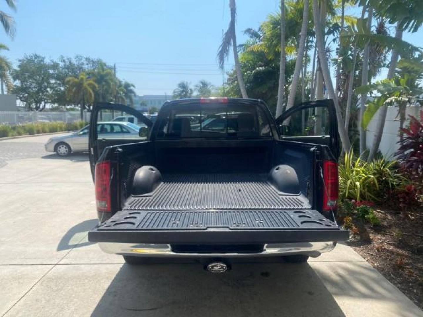 2005 Black /Dark Slate Gray Dodge Ram 1500 SLT 1 OWNER FL LOW MILES 52,299 (1D7HA16D35J) with an 5.7L V8 Hemi Magnum Engine engine, Automatic transmission, located at 4701 North Dixie Hwy, Pompano Beach, FL, 33064, (954) 422-2889, 26.240938, -80.123474 - OUR WEBPAGE FLORIDACARS1.COM HAS OVER 100 PHOTOS AND FREE CARFAX LINK 2005 DODGE RAM 1500 SLT 1 OWNER FLORIDA LIKE NEW! VIN: 1D7HA16D35J624608 1 D 7 H A 1 6 D 3 5 J 6 2 4 6 0 8 PICKUP 5.7L V8 F HEMI 5.7 V8 GASOLINE REAR WHEEL DRIVE Top Features Alloy Wheels Bed Liner Cloth Seats Basic Features ABS B - Photo#15
