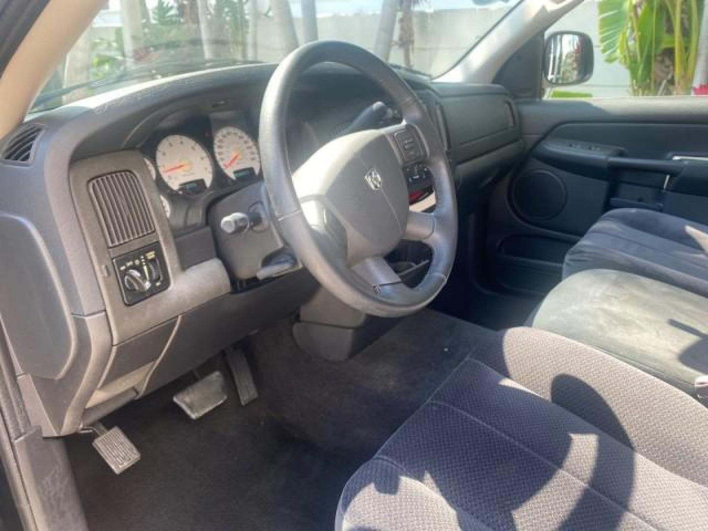 2005 Black /Dark Slate Gray Dodge Ram 1500 SLT 1 OWNER FL LOW MILES 52,299 (1D7HA16D35J) with an 5.7L V8 Hemi Magnum Engine engine, Automatic transmission, located at 4701 North Dixie Hwy, Pompano Beach, FL, 33064, (954) 422-2889, 26.240938, -80.123474 - OUR WEBPAGE FLORIDACARS1.COM HAS OVER 100 PHOTOS AND FREE CARFAX LINK 2005 DODGE RAM 1500 SLT 1 OWNER FLORIDA LIKE NEW! VIN: 1D7HA16D35J624608 1 D 7 H A 1 6 D 3 5 J 6 2 4 6 0 8 PICKUP 5.7L V8 F HEMI 5.7 V8 GASOLINE REAR WHEEL DRIVE Top Features Alloy Wheels Bed Liner Cloth Seats Basic Features ABS B - Photo#39