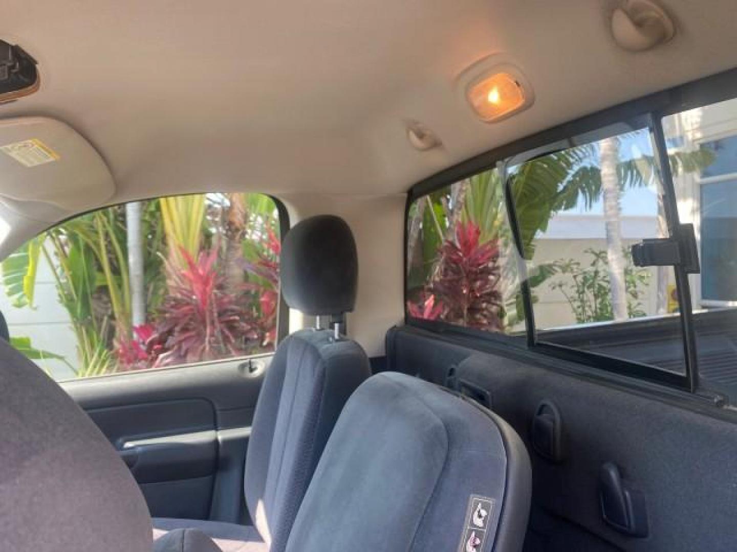 2005 Black /Dark Slate Gray Dodge Ram 1500 SLT 1 OWNER FL LOW MILES 52,299 (1D7HA16D35J) with an 5.7L V8 Hemi Magnum Engine engine, Automatic transmission, located at 4701 North Dixie Hwy, Pompano Beach, FL, 33064, (954) 422-2889, 26.240938, -80.123474 - OUR WEBPAGE FLORIDACARS1.COM HAS OVER 100 PHOTOS AND FREE CARFAX LINK 2005 DODGE RAM 1500 SLT 1 OWNER FLORIDA LIKE NEW! VIN: 1D7HA16D35J624608 1 D 7 H A 1 6 D 3 5 J 6 2 4 6 0 8 PICKUP 5.7L V8 F HEMI 5.7 V8 GASOLINE REAR WHEEL DRIVE Top Features Alloy Wheels Bed Liner Cloth Seats Basic Features ABS B - Photo#57