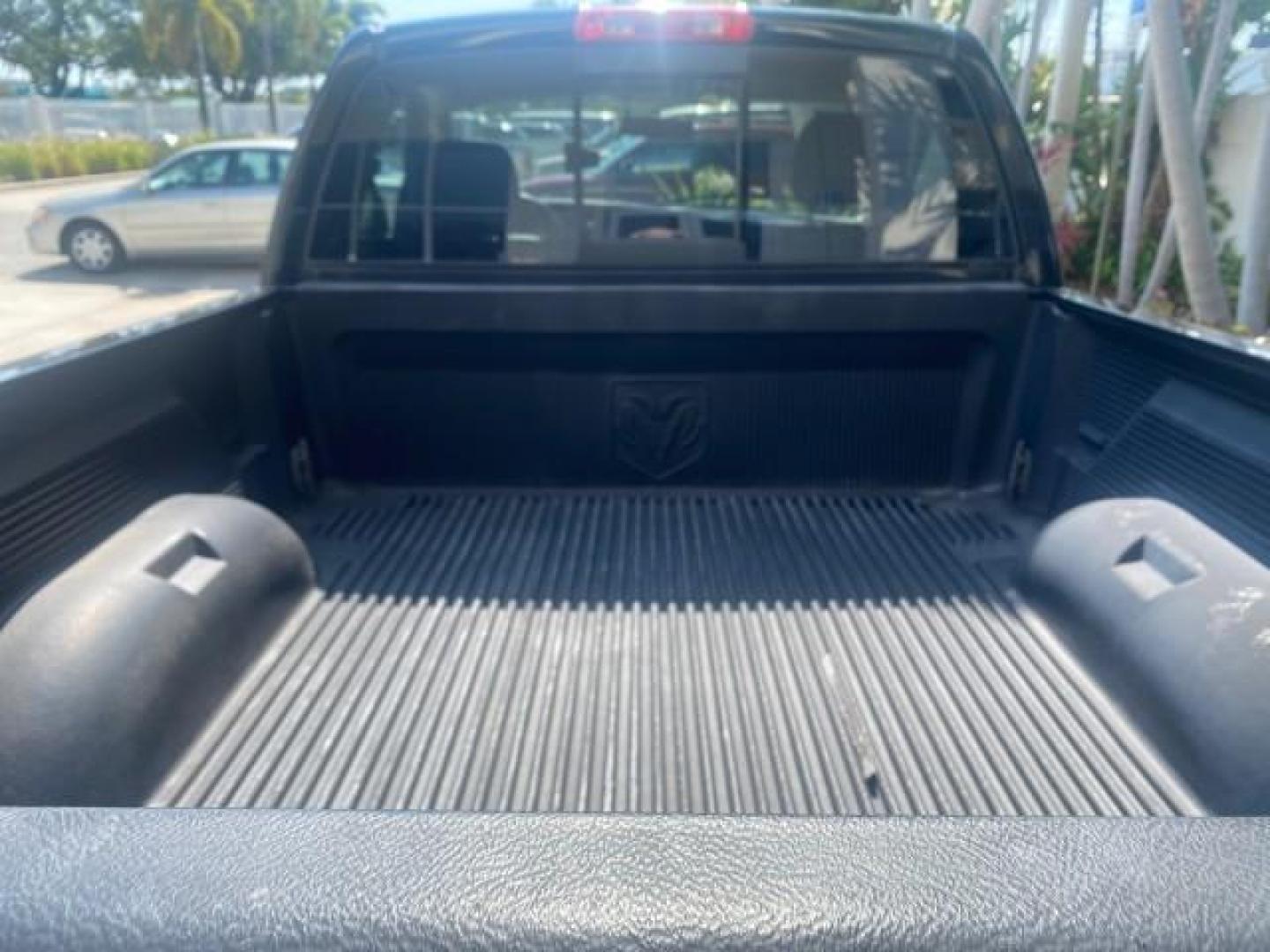 2005 Black /Dark Slate Gray Dodge Ram 1500 SLT 1 OWNER FL LOW MILES 52,299 (1D7HA16D35J) with an 5.7L V8 Hemi Magnum Engine engine, Automatic transmission, located at 4701 North Dixie Hwy, Pompano Beach, FL, 33064, (954) 422-2889, 26.240938, -80.123474 - OUR WEBPAGE FLORIDACARS1.COM HAS OVER 100 PHOTOS AND FREE CARFAX LINK 2005 DODGE RAM 1500 SLT 1 OWNER FLORIDA LIKE NEW! VIN: 1D7HA16D35J624608 1 D 7 H A 1 6 D 3 5 J 6 2 4 6 0 8 PICKUP 5.7L V8 F HEMI 5.7 V8 GASOLINE REAR WHEEL DRIVE Top Features Alloy Wheels Bed Liner Cloth Seats Basic Features ABS B - Photo#67