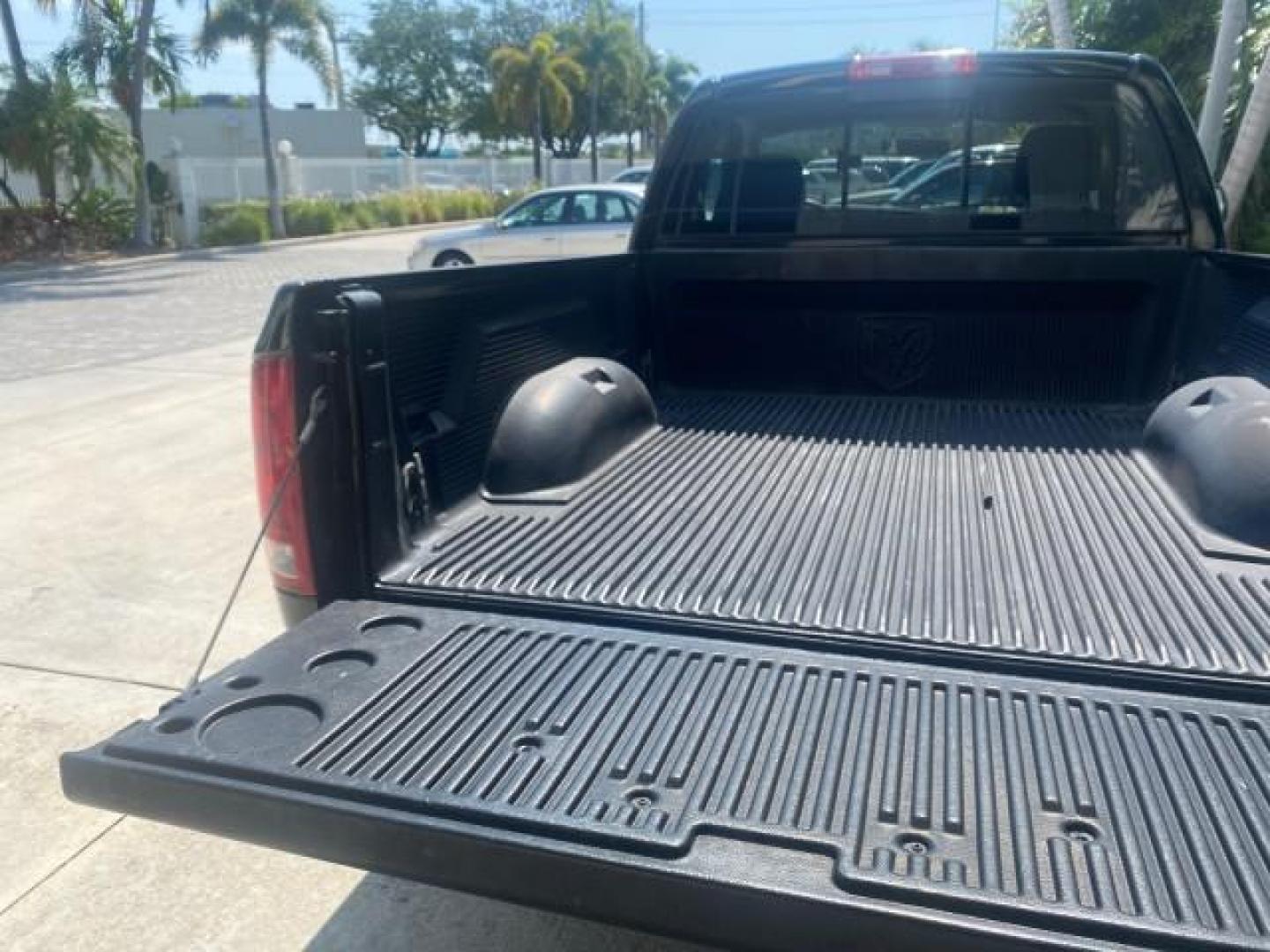 2005 Black /Dark Slate Gray Dodge Ram 1500 SLT 1 OWNER FL LOW MILES 52,299 (1D7HA16D35J) with an 5.7L V8 Hemi Magnum Engine engine, Automatic transmission, located at 4701 North Dixie Hwy, Pompano Beach, FL, 33064, (954) 422-2889, 26.240938, -80.123474 - OUR WEBPAGE FLORIDACARS1.COM HAS OVER 100 PHOTOS AND FREE CARFAX LINK 2005 DODGE RAM 1500 SLT 1 OWNER FLORIDA LIKE NEW! VIN: 1D7HA16D35J624608 1 D 7 H A 1 6 D 3 5 J 6 2 4 6 0 8 PICKUP 5.7L V8 F HEMI 5.7 V8 GASOLINE REAR WHEEL DRIVE Top Features Alloy Wheels Bed Liner Cloth Seats Basic Features ABS B - Photo#71