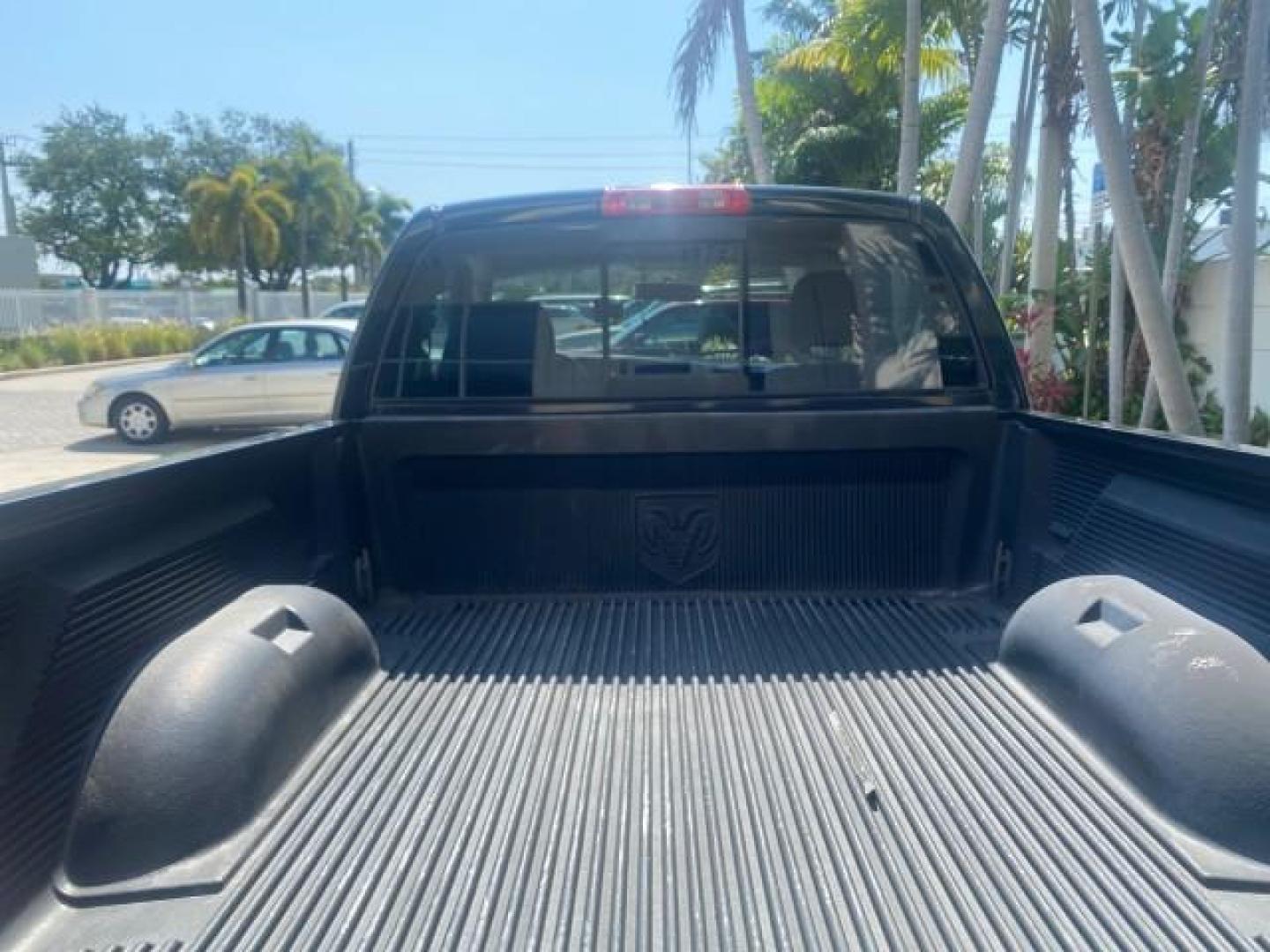 2005 Black /Dark Slate Gray Dodge Ram 1500 SLT 1 OWNER FL LOW MILES 52,299 (1D7HA16D35J) with an 5.7L V8 Hemi Magnum Engine engine, Automatic transmission, located at 4701 North Dixie Hwy, Pompano Beach, FL, 33064, (954) 422-2889, 26.240938, -80.123474 - OUR WEBPAGE FLORIDACARS1.COM HAS OVER 100 PHOTOS AND FREE CARFAX LINK 2005 DODGE RAM 1500 SLT 1 OWNER FLORIDA LIKE NEW! VIN: 1D7HA16D35J624608 1 D 7 H A 1 6 D 3 5 J 6 2 4 6 0 8 PICKUP 5.7L V8 F HEMI 5.7 V8 GASOLINE REAR WHEEL DRIVE Top Features Alloy Wheels Bed Liner Cloth Seats Basic Features ABS B - Photo#73