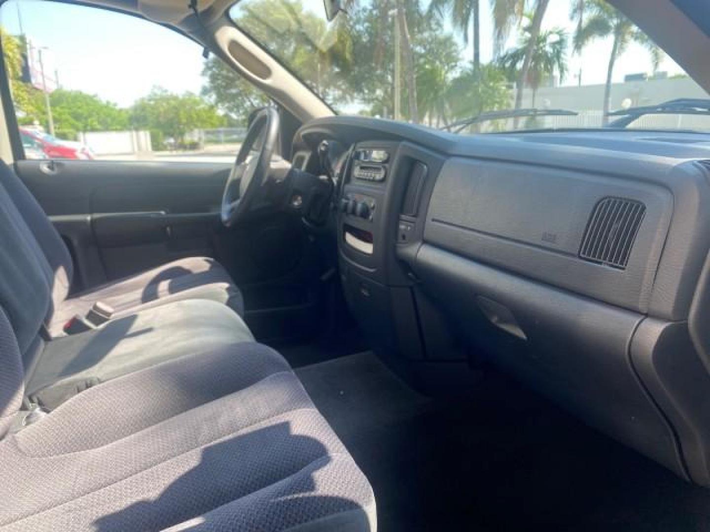 2005 Black /Dark Slate Gray Dodge Ram 1500 SLT 1 OWNER FL LOW MILES 52,299 (1D7HA16D35J) with an 5.7L V8 Hemi Magnum Engine engine, Automatic transmission, located at 4701 North Dixie Hwy, Pompano Beach, FL, 33064, (954) 422-2889, 26.240938, -80.123474 - OUR WEBPAGE FLORIDACARS1.COM HAS OVER 100 PHOTOS AND FREE CARFAX LINK 2005 DODGE RAM 1500 SLT 1 OWNER FLORIDA LIKE NEW! VIN: 1D7HA16D35J624608 1 D 7 H A 1 6 D 3 5 J 6 2 4 6 0 8 PICKUP 5.7L V8 F HEMI 5.7 V8 GASOLINE REAR WHEEL DRIVE Top Features Alloy Wheels Bed Liner Cloth Seats Basic Features ABS B - Photo#86