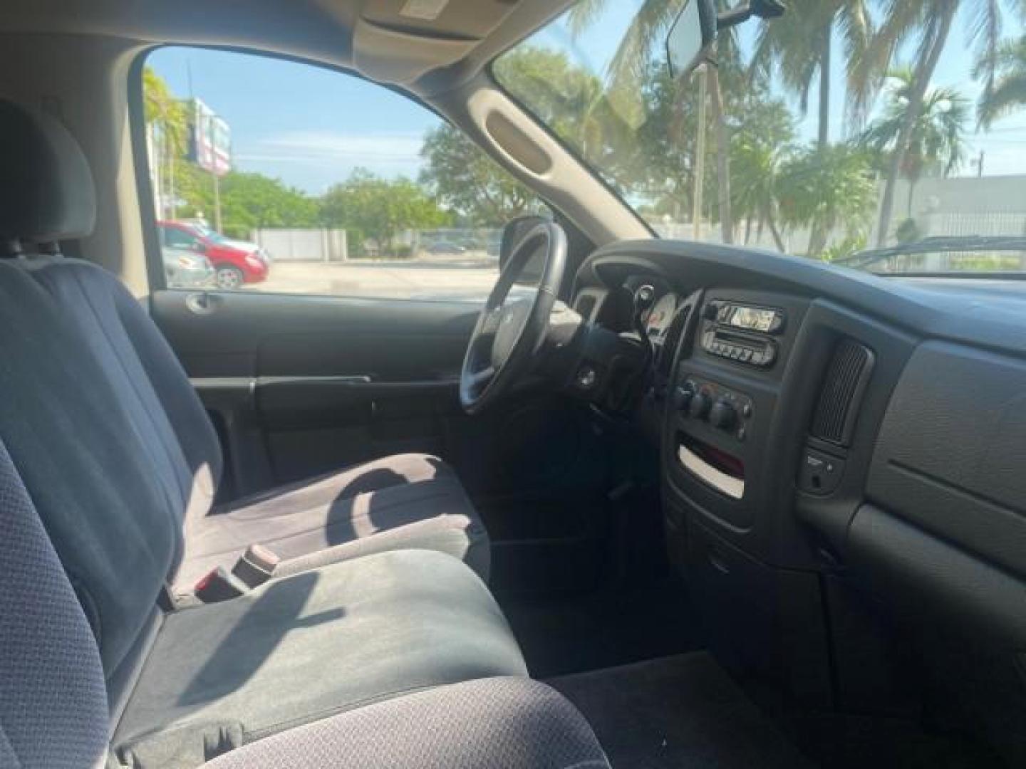 2005 Black /Dark Slate Gray Dodge Ram 1500 SLT 1 OWNER FL LOW MILES 52,299 (1D7HA16D35J) with an 5.7L V8 Hemi Magnum Engine engine, Automatic transmission, located at 4701 North Dixie Hwy, Pompano Beach, FL, 33064, (954) 422-2889, 26.240938, -80.123474 - OUR WEBPAGE FLORIDACARS1.COM HAS OVER 100 PHOTOS AND FREE CARFAX LINK 2005 DODGE RAM 1500 SLT 1 OWNER FLORIDA LIKE NEW! VIN: 1D7HA16D35J624608 1 D 7 H A 1 6 D 3 5 J 6 2 4 6 0 8 PICKUP 5.7L V8 F HEMI 5.7 V8 GASOLINE REAR WHEEL DRIVE Top Features Alloy Wheels Bed Liner Cloth Seats Basic Features ABS B - Photo#88