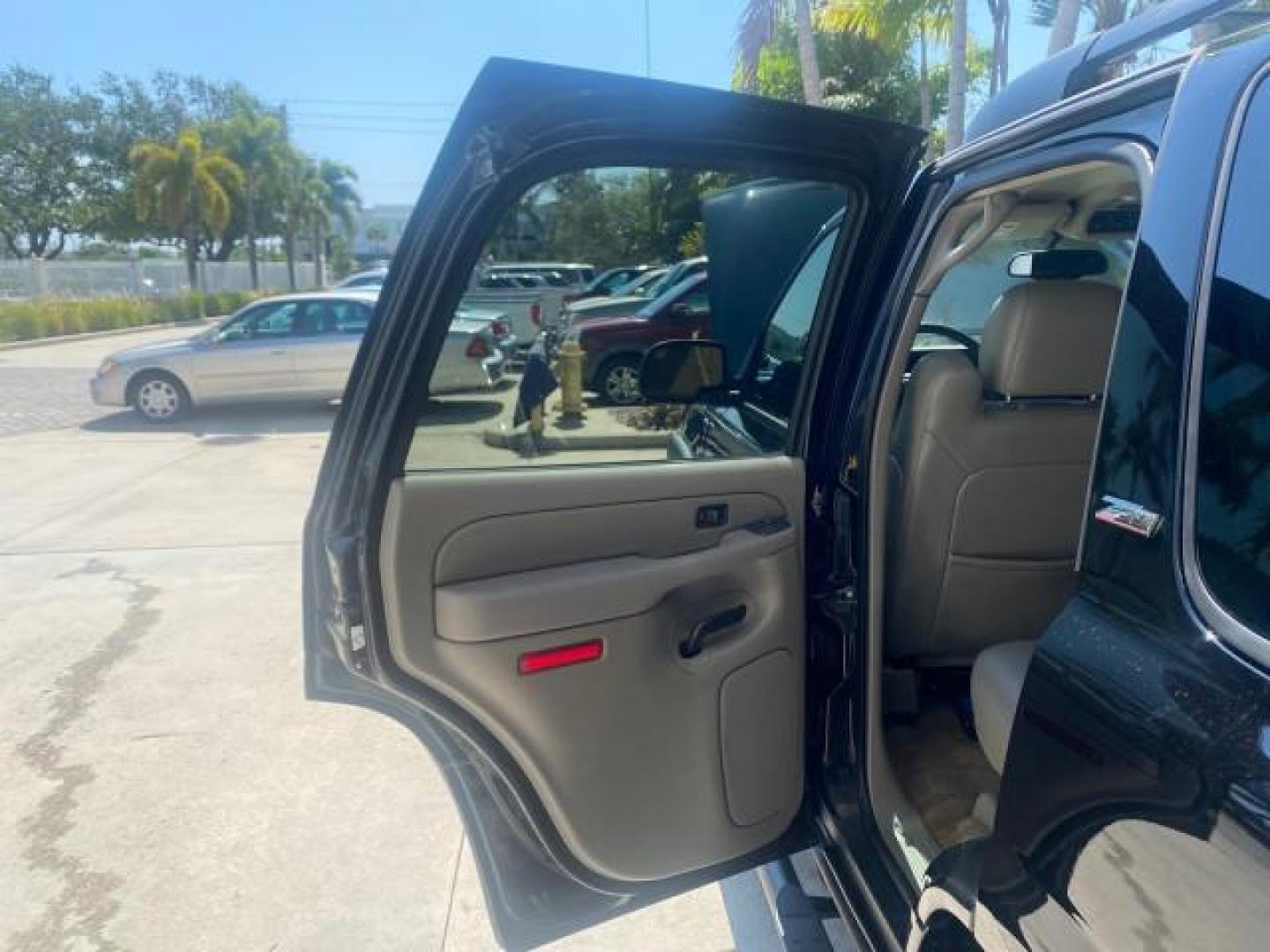2005 Black /Gray/Dark Charcoal Chevrolet Tahoe LS Z71 1 OWNER LOW MILES 82,796 (1GNEC13T85R) with an 5.3L Vortec 5300 V8 SFI Engine engine, Automatic transmission, located at 4701 North Dixie Hwy, Pompano Beach, FL, 33064, (954) 422-2889, 26.240938, -80.123474 - OUR WEBPAGE FLORIDACARS1.COM HAS OVER 100 PHOTOS AND FREE CARFAX LINK 2005 CHEVROLET TAHOE LS 1 OWNER NO ACCIDENTS16 SERVICE RECORDS VIN: 1GNEC13T85R212888 1 G N E C 1 3 T 8 5 R 2 1 2 8 8 8 4 DOOR WAGON/SPORT UTILITY 5.3L V8 F GASOLINE REAR WHEEL DRIVE Top Features Alloy Wheels Rear Air Conditioning - Photo#13