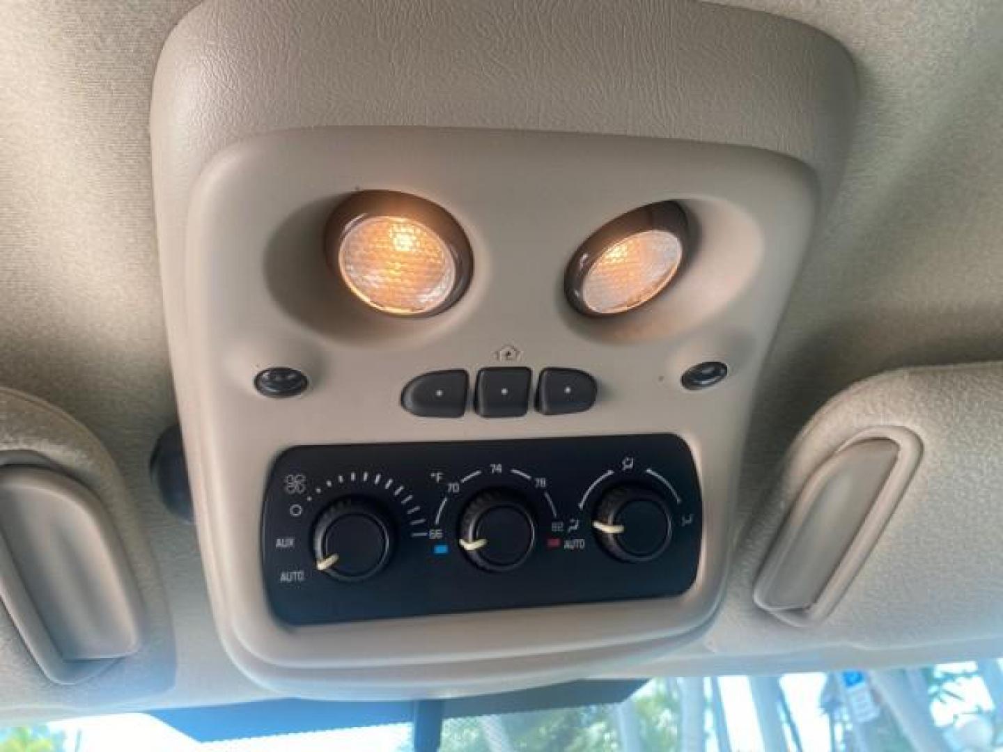2005 Black /Gray/Dark Charcoal Chevrolet Tahoe LS Z71 1 OWNER LOW MILES 82,796 (1GNEC13T85R) with an 5.3L Vortec 5300 V8 SFI Engine engine, Automatic transmission, located at 4701 North Dixie Hwy, Pompano Beach, FL, 33064, (954) 422-2889, 26.240938, -80.123474 - OUR WEBPAGE FLORIDACARS1.COM HAS OVER 100 PHOTOS AND FREE CARFAX LINK 2005 CHEVROLET TAHOE LS 1 OWNER NO ACCIDENTS16 SERVICE RECORDS VIN: 1GNEC13T85R212888 1 G N E C 1 3 T 8 5 R 2 1 2 8 8 8 4 DOOR WAGON/SPORT UTILITY 5.3L V8 F GASOLINE REAR WHEEL DRIVE Top Features Alloy Wheels Rear Air Conditioning - Photo#52