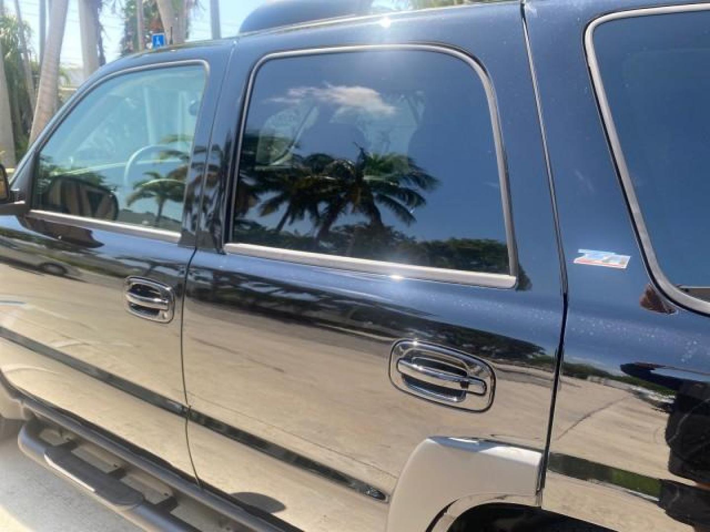 2005 Black /Gray/Dark Charcoal Chevrolet Tahoe LS Z71 1 OWNER LOW MILES 82,796 (1GNEC13T85R) with an 5.3L Vortec 5300 V8 SFI Engine engine, Automatic transmission, located at 4701 North Dixie Hwy, Pompano Beach, FL, 33064, (954) 422-2889, 26.240938, -80.123474 - OUR WEBPAGE FLORIDACARS1.COM HAS OVER 100 PHOTOS AND FREE CARFAX LINK 2005 CHEVROLET TAHOE LS 1 OWNER NO ACCIDENTS16 SERVICE RECORDS VIN: 1GNEC13T85R212888 1 G N E C 1 3 T 8 5 R 2 1 2 8 8 8 4 DOOR WAGON/SPORT UTILITY 5.3L V8 F GASOLINE REAR WHEEL DRIVE Top Features Alloy Wheels Rear Air Conditioning - Photo#59