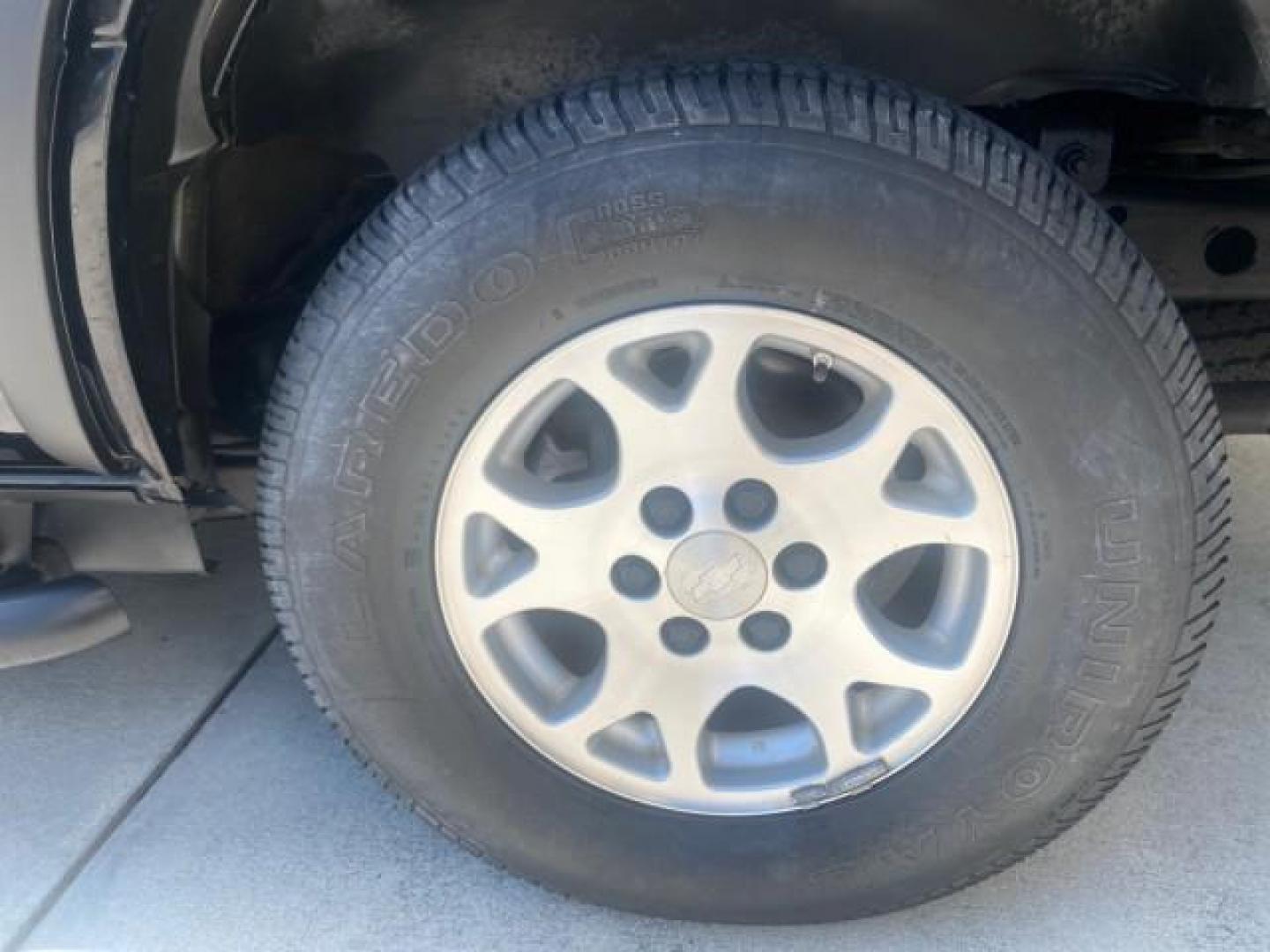 2005 Black /Gray/Dark Charcoal Chevrolet Tahoe LS Z71 1 OWNER LOW MILES 82,796 (1GNEC13T85R) with an 5.3L Vortec 5300 V8 SFI Engine engine, Automatic transmission, located at 4701 North Dixie Hwy, Pompano Beach, FL, 33064, (954) 422-2889, 26.240938, -80.123474 - OUR WEBPAGE FLORIDACARS1.COM HAS OVER 100 PHOTOS AND FREE CARFAX LINK 2005 CHEVROLET TAHOE LS 1 OWNER NO ACCIDENTS16 SERVICE RECORDS VIN: 1GNEC13T85R212888 1 G N E C 1 3 T 8 5 R 2 1 2 8 8 8 4 DOOR WAGON/SPORT UTILITY 5.3L V8 F GASOLINE REAR WHEEL DRIVE Top Features Alloy Wheels Rear Air Conditioning - Photo#72