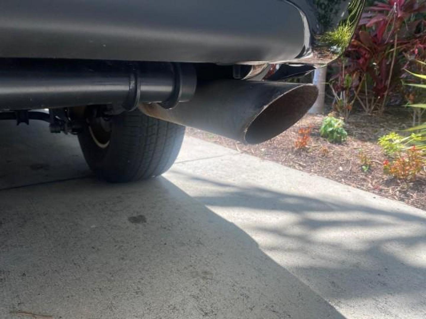 2005 Black /Gray/Dark Charcoal Chevrolet Tahoe LS Z71 1 OWNER LOW MILES 82,796 (1GNEC13T85R) with an 5.3L Vortec 5300 V8 SFI Engine engine, Automatic transmission, located at 4701 North Dixie Hwy, Pompano Beach, FL, 33064, (954) 422-2889, 26.240938, -80.123474 - OUR WEBPAGE FLORIDACARS1.COM HAS OVER 100 PHOTOS AND FREE CARFAX LINK 2005 CHEVROLET TAHOE LS 1 OWNER NO ACCIDENTS16 SERVICE RECORDS VIN: 1GNEC13T85R212888 1 G N E C 1 3 T 8 5 R 2 1 2 8 8 8 4 DOOR WAGON/SPORT UTILITY 5.3L V8 F GASOLINE REAR WHEEL DRIVE Top Features Alloy Wheels Rear Air Conditioning - Photo#82