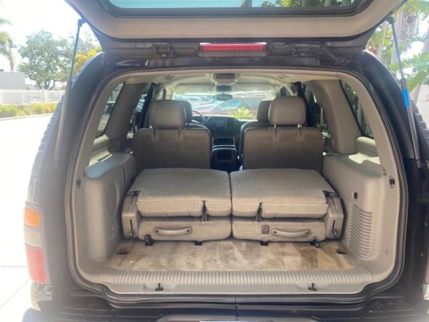 2005 Black /Gray/Dark Charcoal Chevrolet Tahoe LS Z71 1 OWNER LOW MILES 82,796 (1GNEC13T85R) with an 5.3L Vortec 5300 V8 SFI Engine engine, Automatic transmission, located at 4701 North Dixie Hwy, Pompano Beach, FL, 33064, (954) 422-2889, 26.240938, -80.123474 - OUR WEBPAGE FLORIDACARS1.COM HAS OVER 100 PHOTOS AND FREE CARFAX LINK 2005 CHEVROLET TAHOE LS 1 OWNER NO ACCIDENTS16 SERVICE RECORDS VIN: 1GNEC13T85R212888 1 G N E C 1 3 T 8 5 R 2 1 2 8 8 8 4 DOOR WAGON/SPORT UTILITY 5.3L V8 F GASOLINE REAR WHEEL DRIVE Top Features Alloy Wheels Rear Air Conditioning - Photo#84