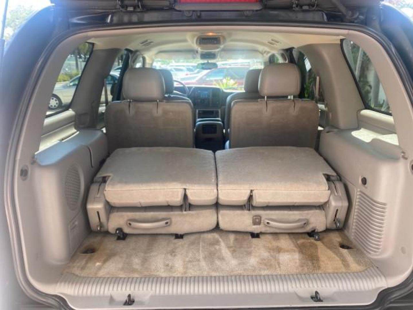 2005 Black /Gray/Dark Charcoal Chevrolet Tahoe LS Z71 1 OWNER LOW MILES 82,796 (1GNEC13T85R) with an 5.3L Vortec 5300 V8 SFI Engine engine, Automatic transmission, located at 4701 North Dixie Hwy, Pompano Beach, FL, 33064, (954) 422-2889, 26.240938, -80.123474 - OUR WEBPAGE FLORIDACARS1.COM HAS OVER 100 PHOTOS AND FREE CARFAX LINK 2005 CHEVROLET TAHOE LS 1 OWNER NO ACCIDENTS16 SERVICE RECORDS VIN: 1GNEC13T85R212888 1 G N E C 1 3 T 8 5 R 2 1 2 8 8 8 4 DOOR WAGON/SPORT UTILITY 5.3L V8 F GASOLINE REAR WHEEL DRIVE Top Features Alloy Wheels Rear Air Conditioning - Photo#85