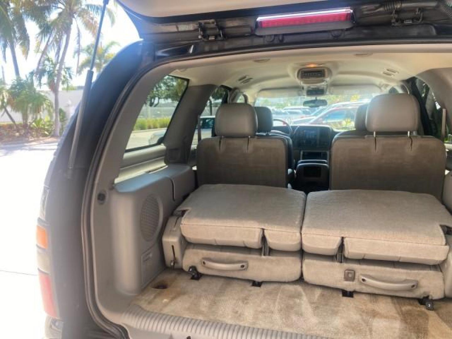 2005 Black /Gray/Dark Charcoal Chevrolet Tahoe LS Z71 1 OWNER LOW MILES 82,796 (1GNEC13T85R) with an 5.3L Vortec 5300 V8 SFI Engine engine, Automatic transmission, located at 4701 North Dixie Hwy, Pompano Beach, FL, 33064, (954) 422-2889, 26.240938, -80.123474 - OUR WEBPAGE FLORIDACARS1.COM HAS OVER 100 PHOTOS AND FREE CARFAX LINK 2005 CHEVROLET TAHOE LS 1 OWNER NO ACCIDENTS16 SERVICE RECORDS VIN: 1GNEC13T85R212888 1 G N E C 1 3 T 8 5 R 2 1 2 8 8 8 4 DOOR WAGON/SPORT UTILITY 5.3L V8 F GASOLINE REAR WHEEL DRIVE Top Features Alloy Wheels Rear Air Conditioning - Photo#87